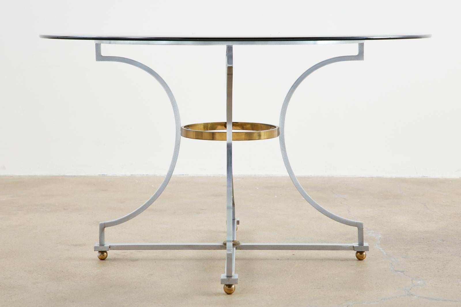 Français Table centrale en acier et bronze de style Maison Jansen en vente