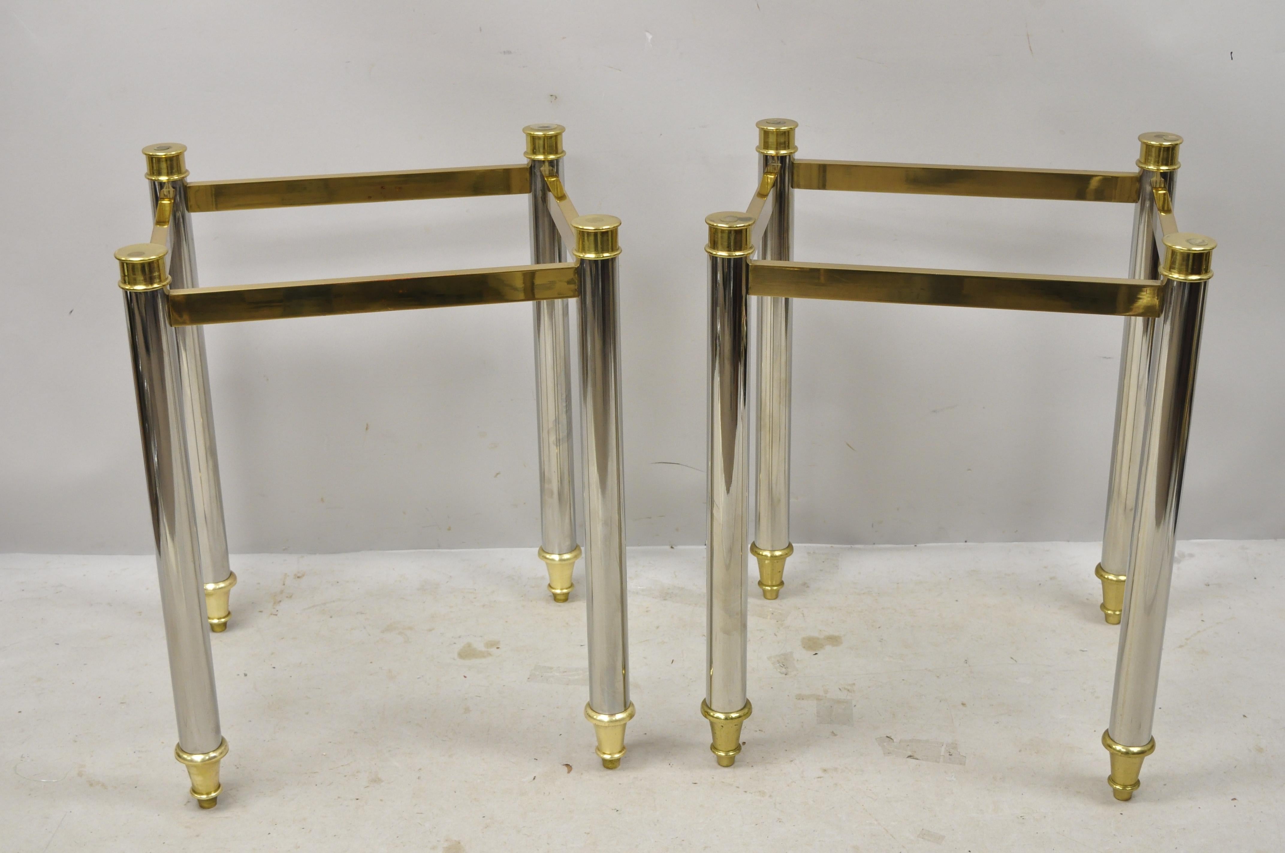 Maison Jansen style steel chrome and brass Italian Hollywood Regency end tables - a pair. Item features heavy chrome-plated steel frame, brass accents and feet, no glass tops, circa mid-late 20th century. Measurements: 28.25