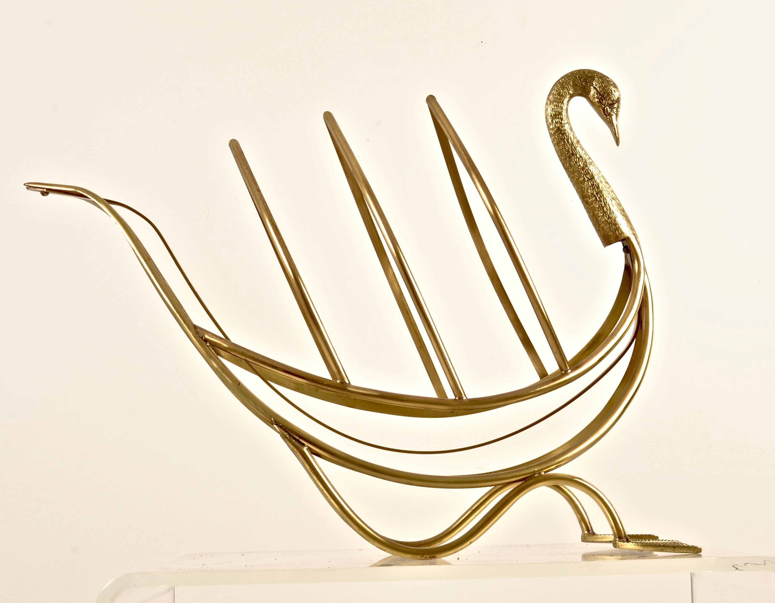Charming swan form magazine stand in solid brass, designed by Maison Jansen. Marked 