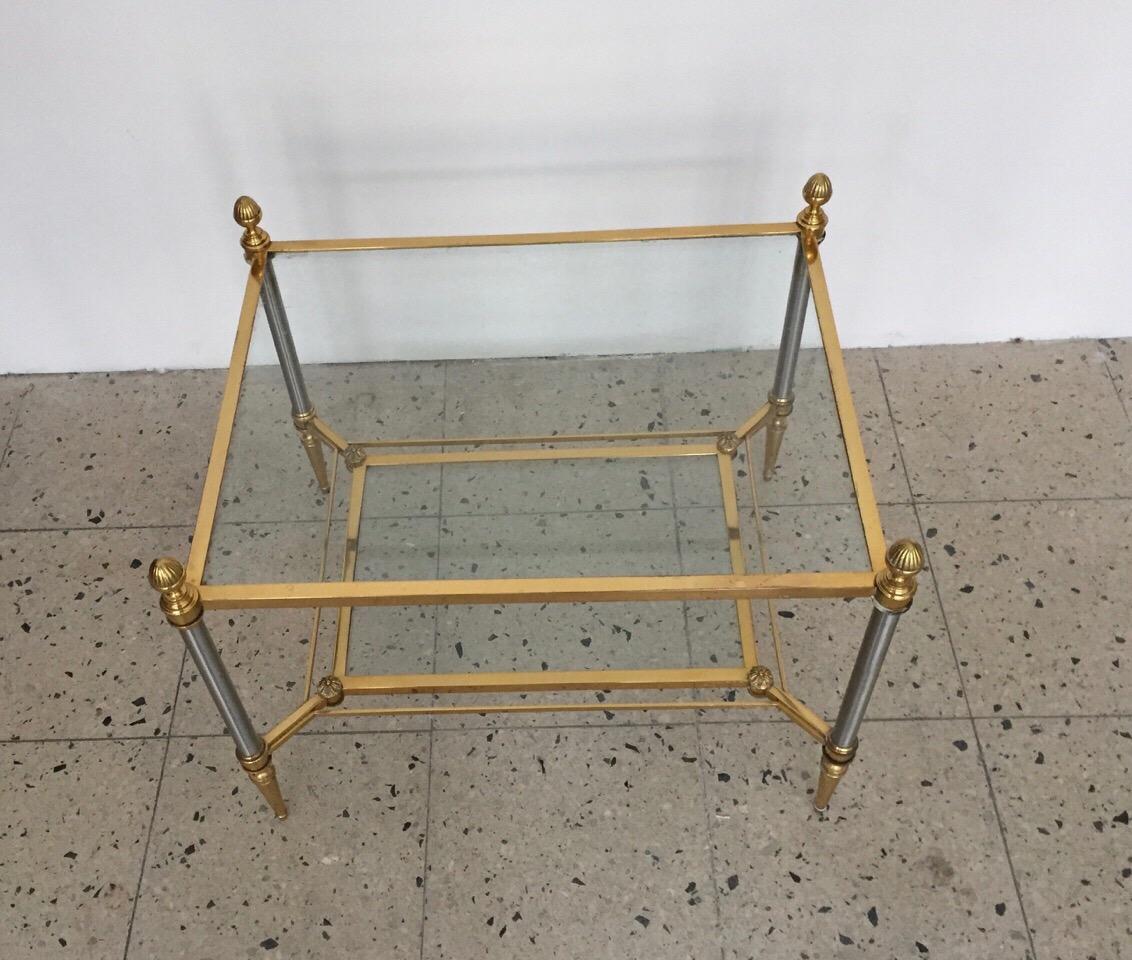 End table gilt Bronze and glass top by Maison Jansen.