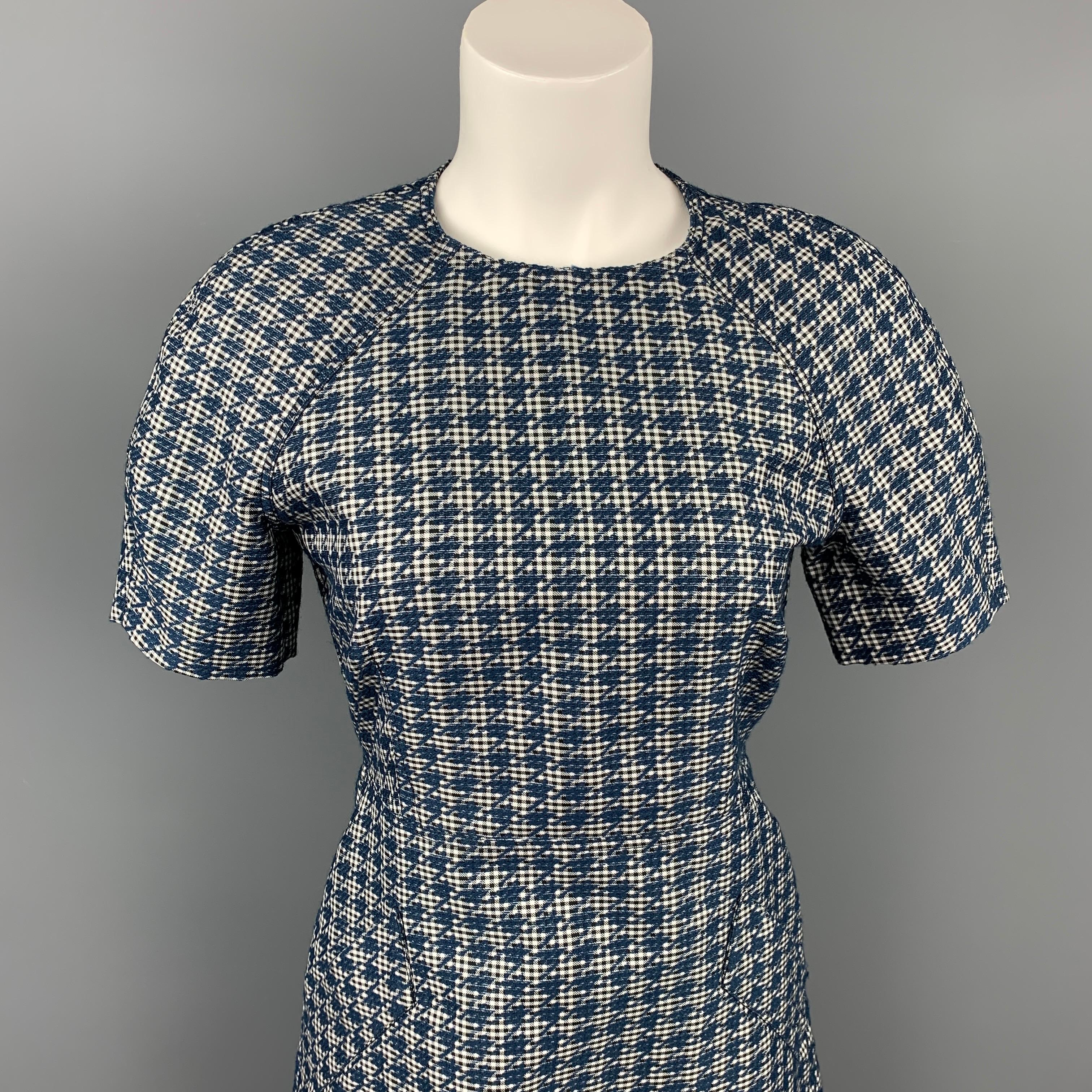 MAISON KITSUNE dress comes in a blue gingham polyester blend with a full liner featuring an a-line style, slit pockets, and a back zip up closure. 

Very Good Pre-Owned Condition.
Marked: 36

Measurements:

Shoulder: 17 in.
Bust: 32 in.
Waist: 28