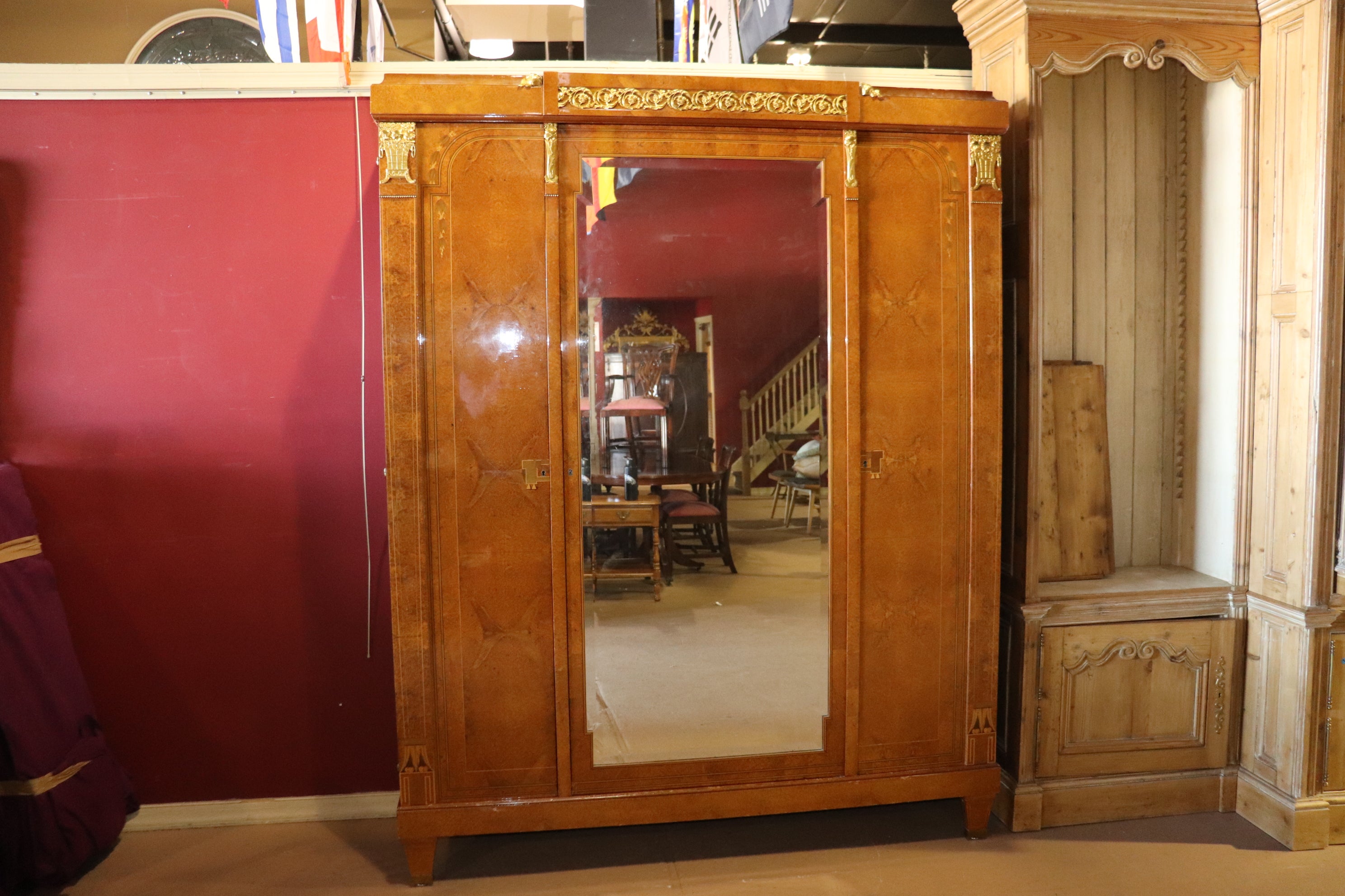 Dimensions- H: 91in W: 72in D: 20in 
This Maison Krieger French Deco Armoire With Ormolu Mounts is nothing but exceptional! This museum quality piece is a prime example of some of the finest french deco furniture to ever be created! This piece is