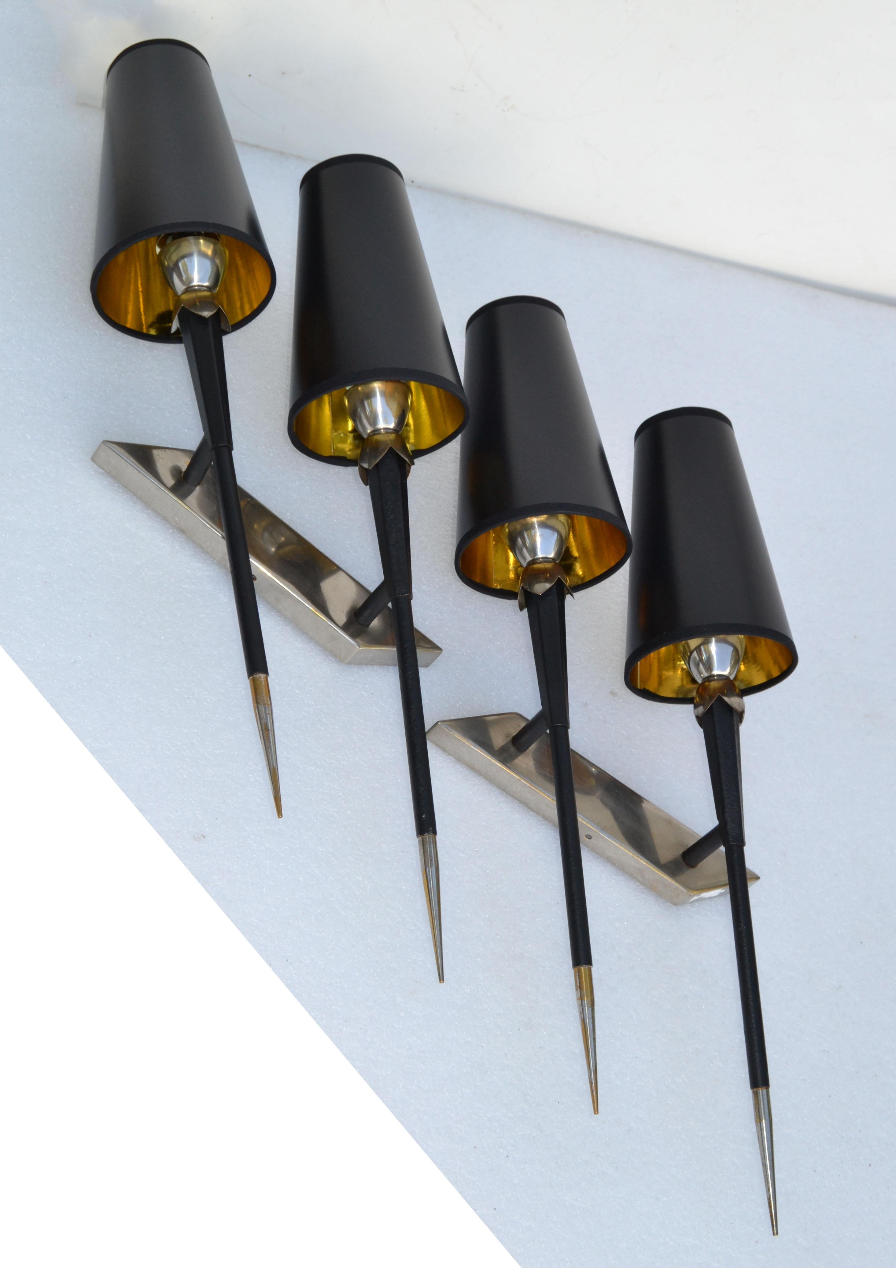 Very elegant pair of circa 1960 2 Light chrome and black sconces for Maison Lancel, France.
Wired for US and in working condition. Each wall sconce takes 2-light bulb with max. 40 watts.
Back plate: 10.5 x 2 x 1 inches.
Projection from the Wall: