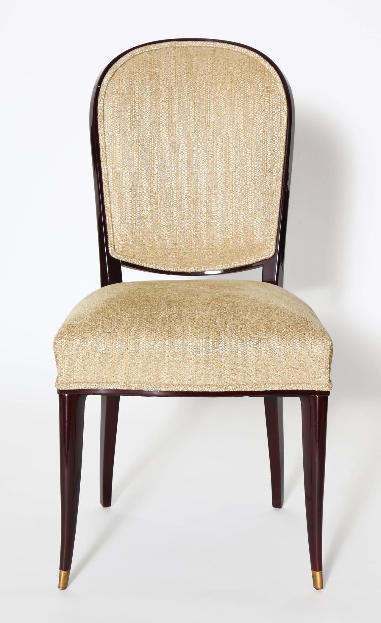 Pair of dining chairs in original Beka lacquer by Sain and Tambute´, with gilt bronze sabots. Each chair is numbered: 33341 through 33348

For an illustration of a similar model, see Siriex, Franc¸oise. The House of Leleu. New York: Hudson Hills