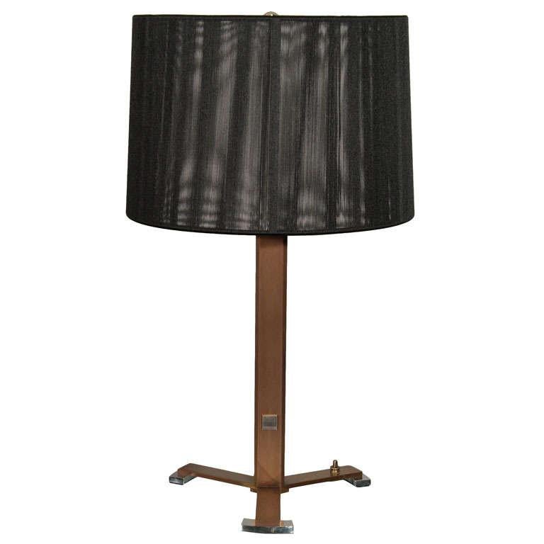 Fine and rare patinated and nickeled bronze table lamp by Leleu 

This piece is entered under number 6008 as “Lampe de bureau” in Leleu’s 