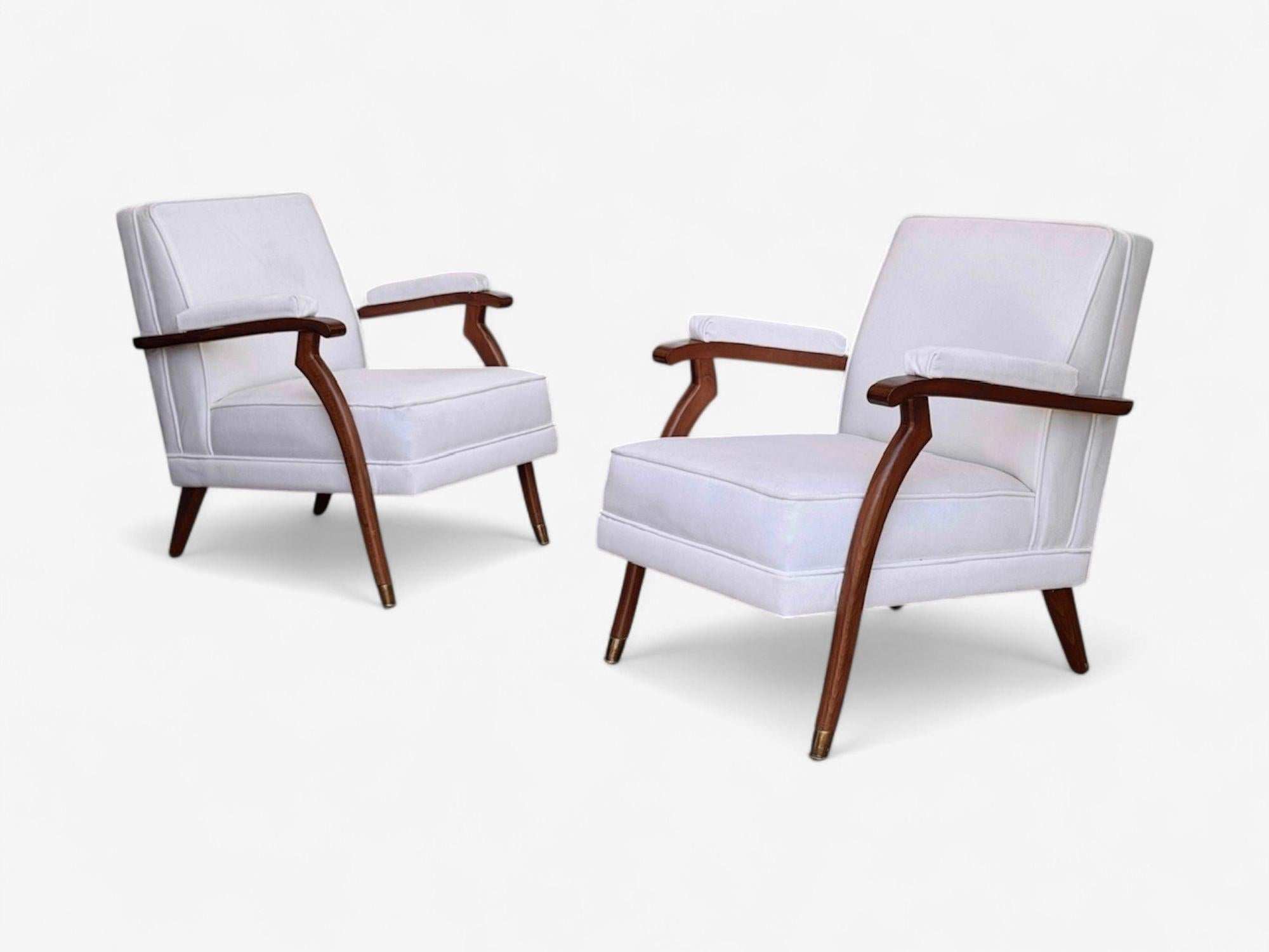 Maison Leleu Style, French Modern, White Mohair, Wood, Lounge Chairs, France c. 1970s

Pair of stained wood and white mohair lounge chairs in the style of Maison Leleu and likely produced in France in the later half of the 20th century. New white