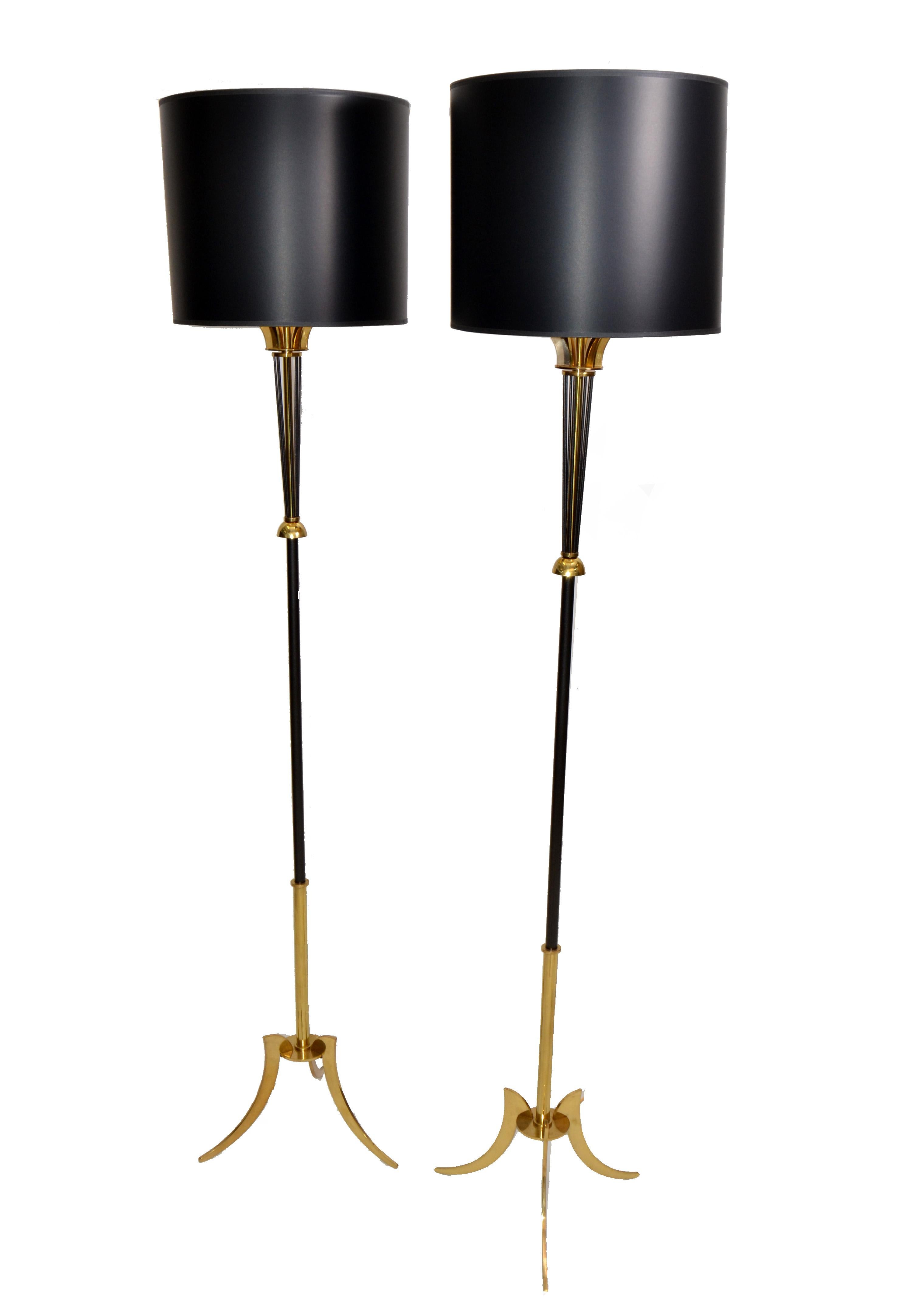 Pair of two patinas brass & gun metal French floor lamp by Maison Lunel, circa 1955 come with black & gold paper shades.
In restored and US Rewired condition and each takes one regular or LED light bulb.
The pair is ready for a new home.