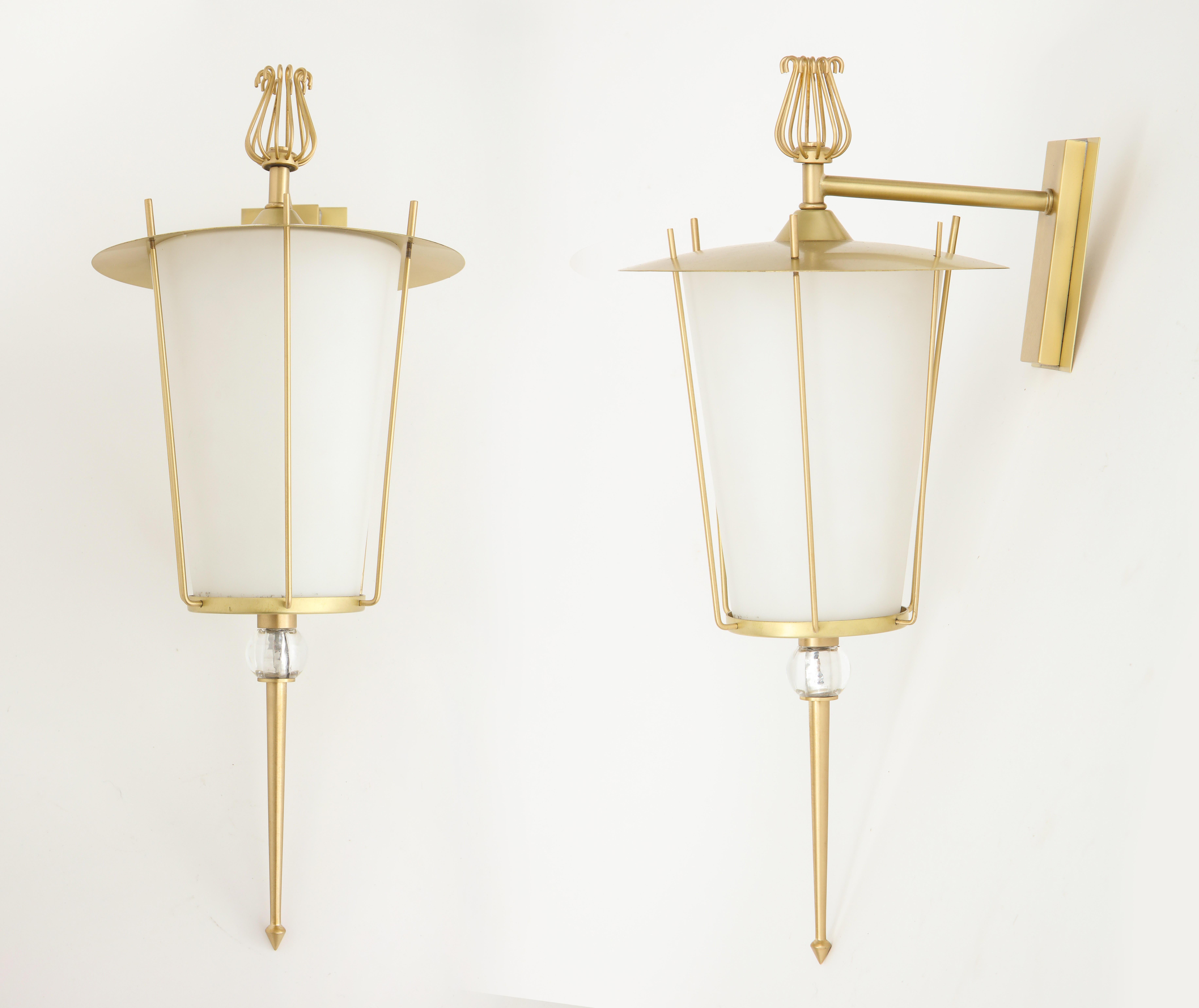Pair of French midcentury lantern style brushed brass sconces with satin finished opaline white glass diffusers. Sconces have been rewired for use in the USA.