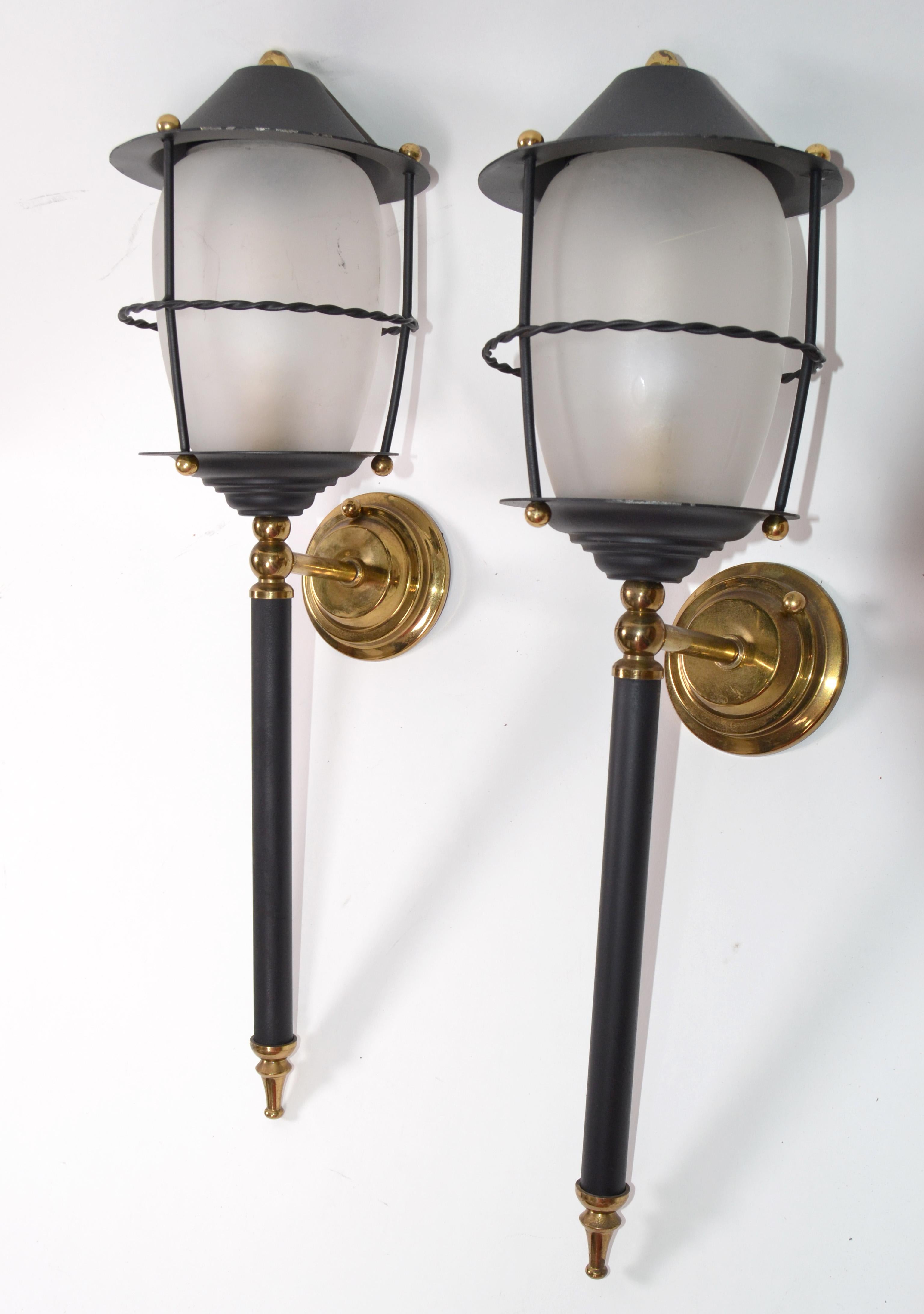 Original pair of French Maison Lunel Mid-Century Modern metal, glass and brass lantern, wall mounted sconces.
Back plate dimension is 3 inches in diameter.
  