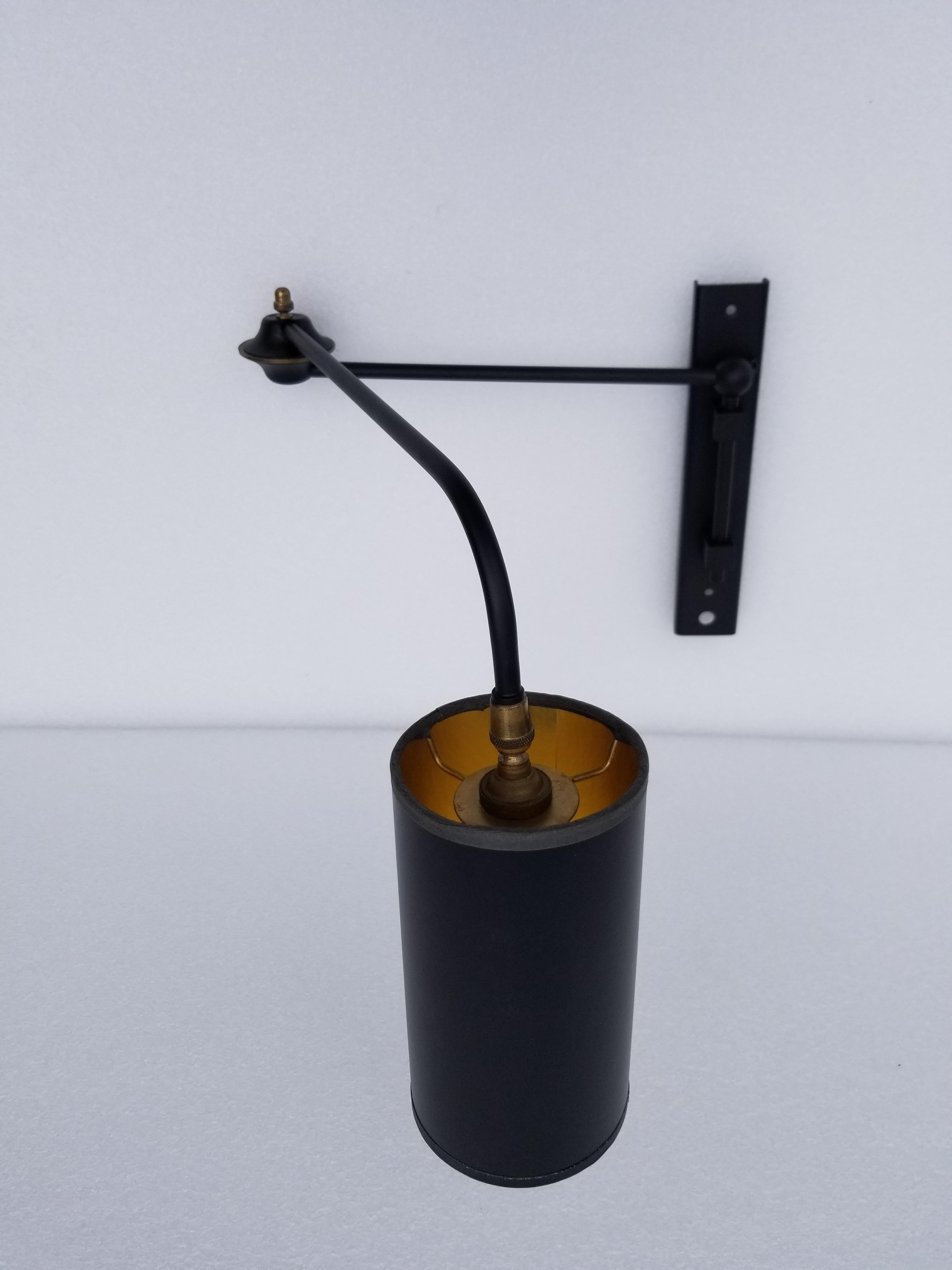 Maison Lunel retractable wall light, one-light, 60 watt max.
US rewired and in working condition.
Dimension closed: !6 inches
Dimension max deployed: 28
12 inches high
Back plate: 2 W/ 10 H.