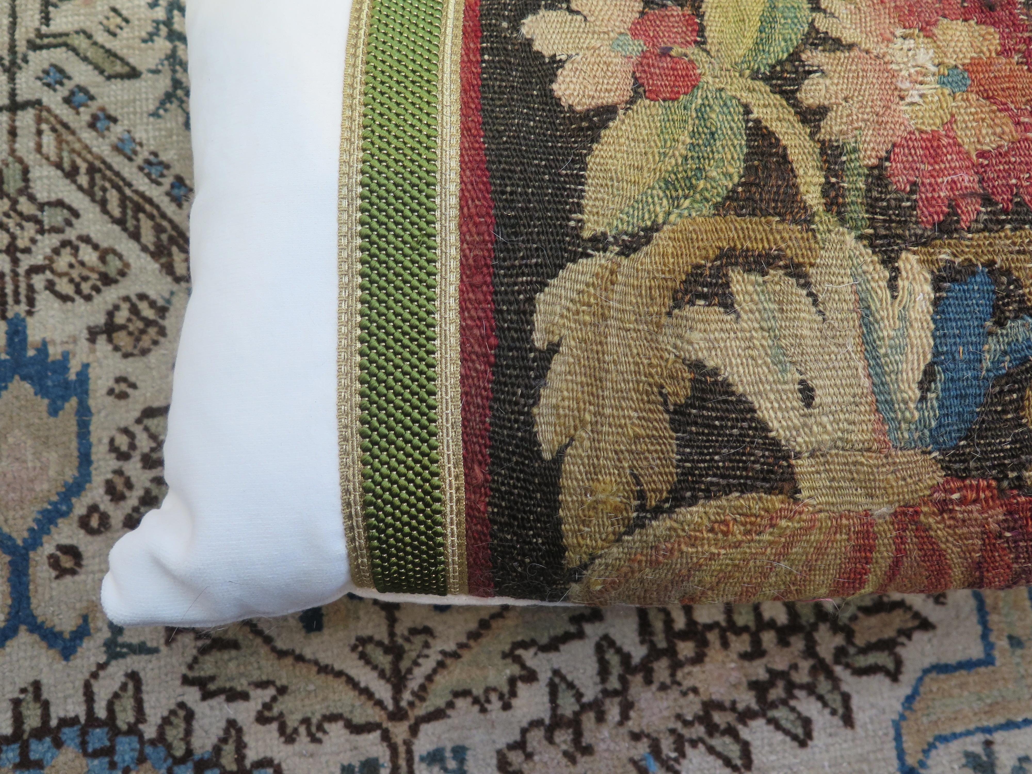 Custom 18th century floral tapestry pillow in Holly Hunt performance velvet and gold metallic trim. Down filled.