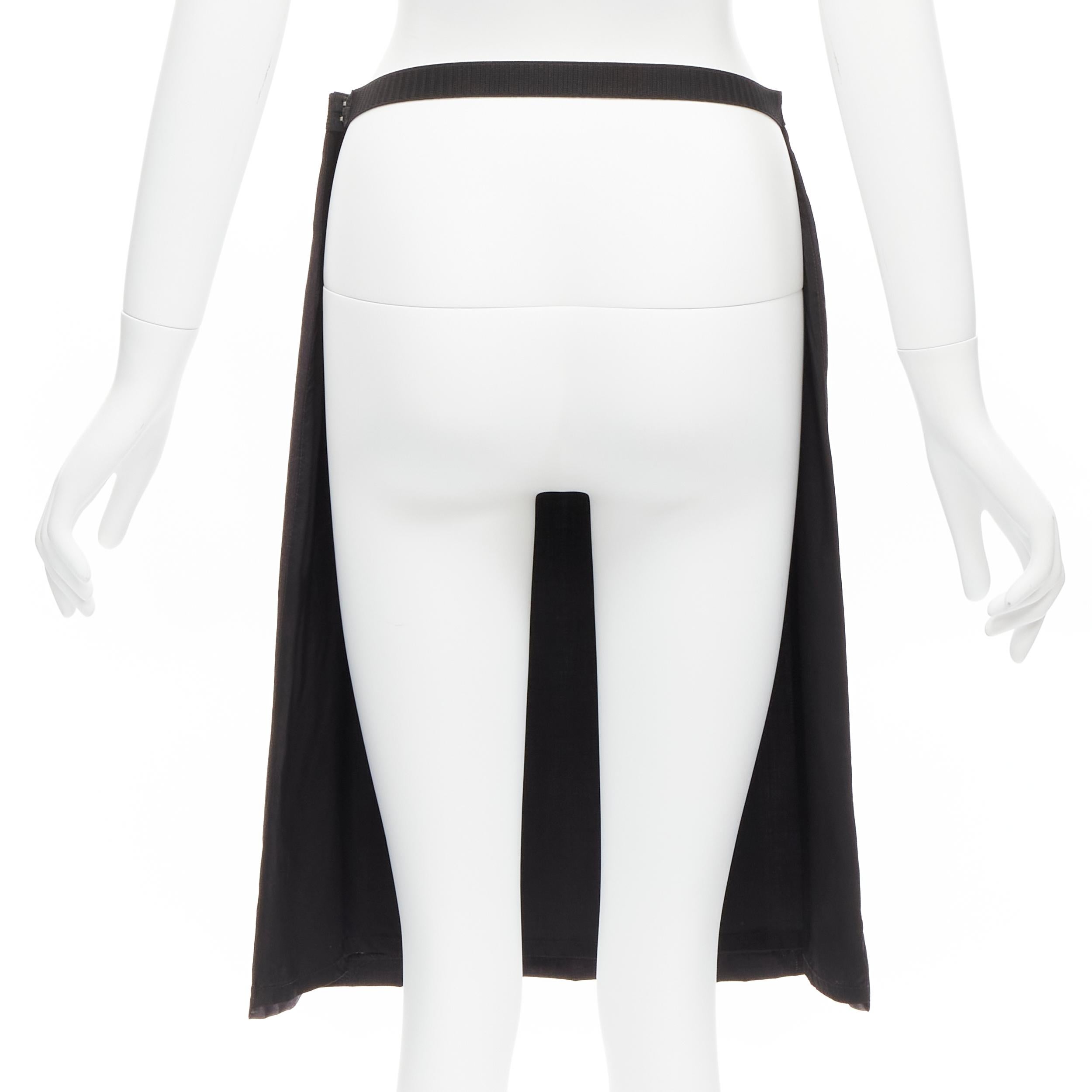 MAISON MARGIELA 1997 Vintage black wool open back pleated half skirt FR42 XL
Reference: TGAS/D00336
Brand: Maison Margiela
Designer: Martin Margiela
Collection: 1997 Spring
Material: Wool
Color: Black
Pattern: Solid
Closure: Hook & Eye
Lining: Black