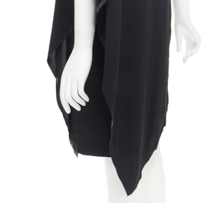 MAISON MARGIELA 2013 vestido capa asimétrica de poliéster negro con cuello en V IT40 S
Referencia: KEDG/A00055
Marca: Maison Margiela
Diseñador: Martin Margiela
Colección: 2013
Color: Negro
Patrón: Sólido
Detalles adicionales: Pegado a lo largo de