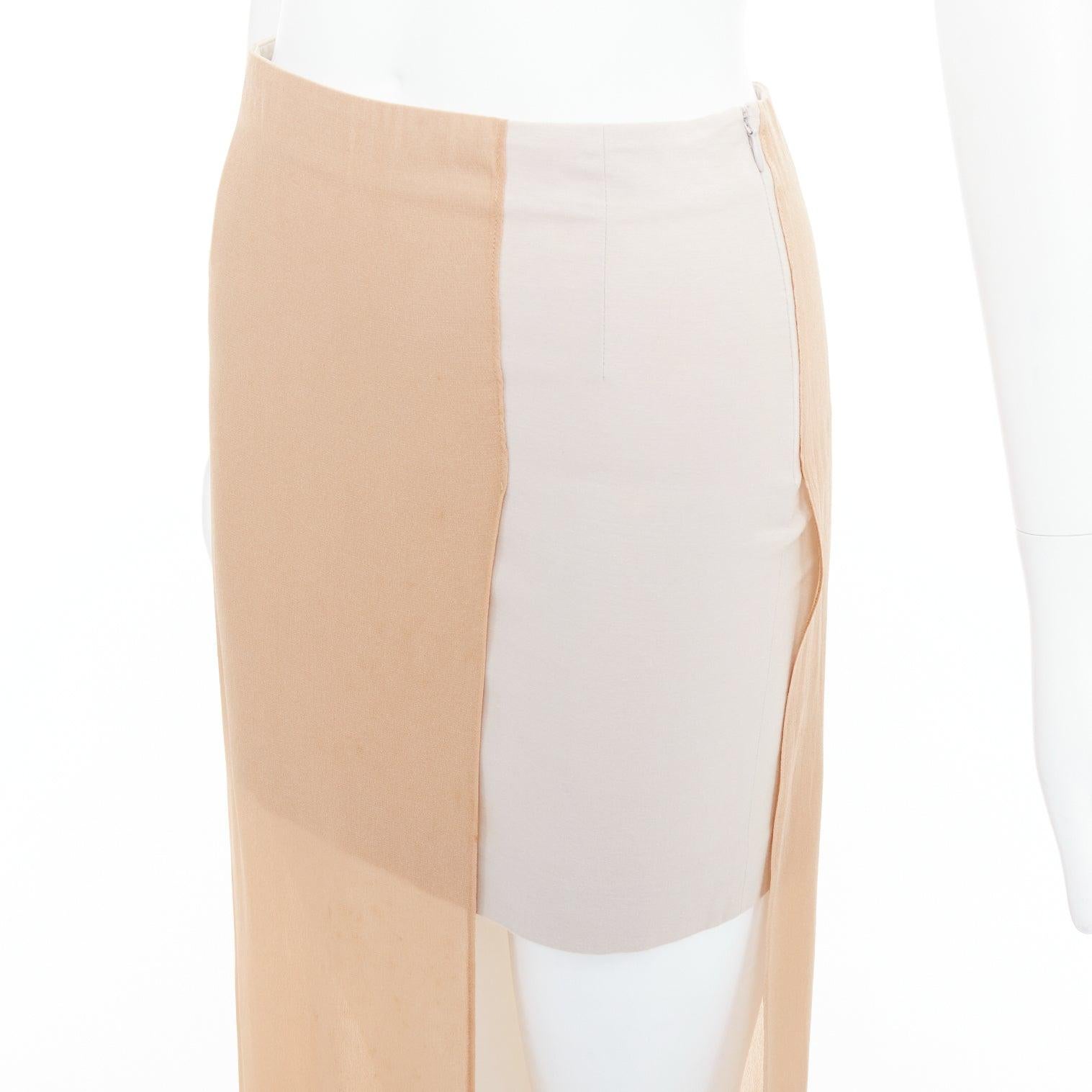 MAISON MARGIELA 2013 nude cream sheer layered asymmetric skirt IT38 XS
Reference: ALCU/A00026
Brand: Maison Margiela
Designer: Martin Margiela
Collection: SS 2013
Material: Acetate, Blend
Color: Nude, Cream
Pattern: Solid
Closure: Zip
Lining: Cream
