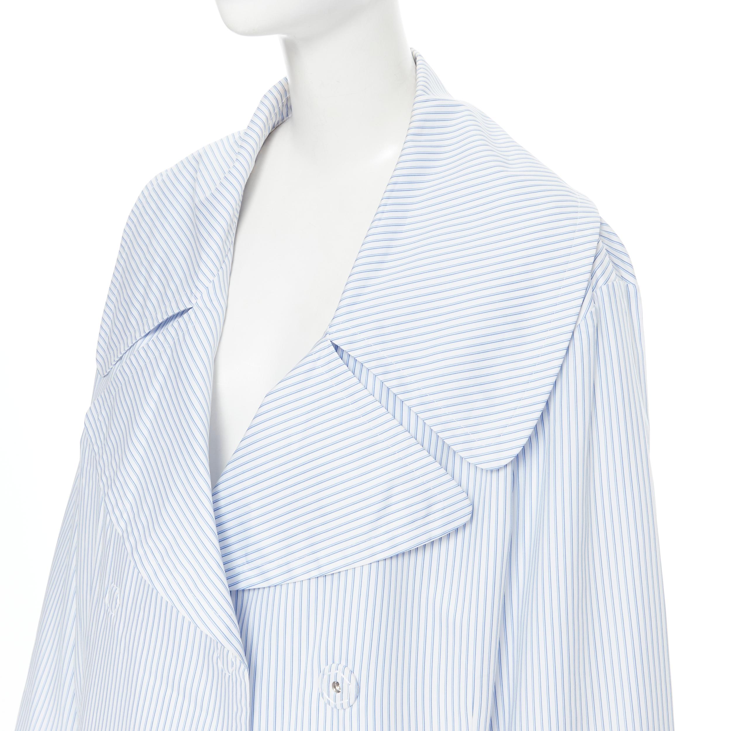 MAISON MARGIELA 2017 blue white pinstripe oversized double breasted coat IT40 S Reference: AEMA/A00031 Brand: Maison Margiela Collection: 2017 Material: Cotton Color: Blue Pattern: Striped Closure: Snap Extra Detail: Oversized spread collar.