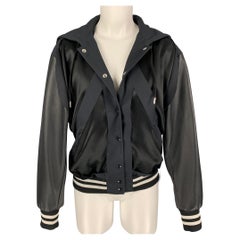 MAISON MARGIELA Veste à découpes en polyester noir et blanc, 2018 Taille 2
