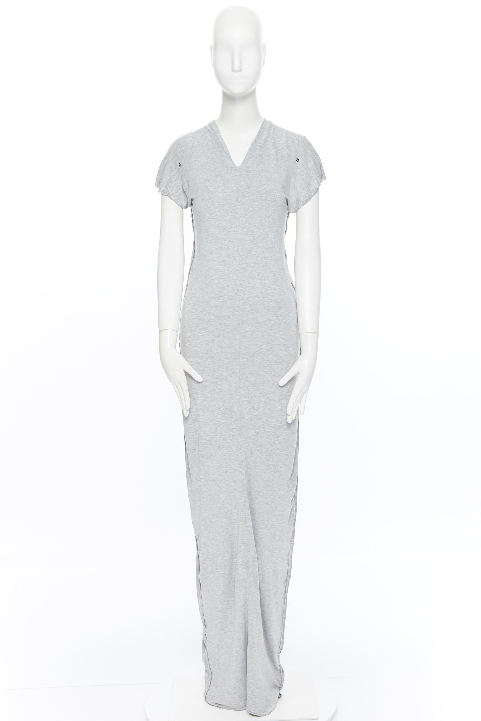 MAISON MARGIELA AW1998 Flat grey cotton raw cut sleeve snap button maxi dress 
Brand: Maison Margiela
Designer: Maison Margiela
Collection: AW1998
Model Name / Style: Casual dress
Material: Cotton
Color: Grey
Pattern: Solid
Extra Detail: Decorative