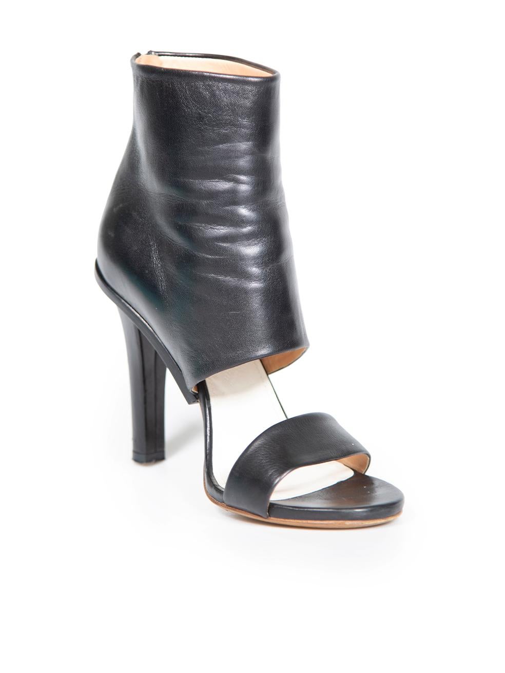 CONDITION is Good. Minor wear to heels is evident. Light wear to uppers with creasing seen around the ankles and a handful of scuff marks found at the heels. Noticeable abrasion through the outsoles on this used Maison Margiela designer resale