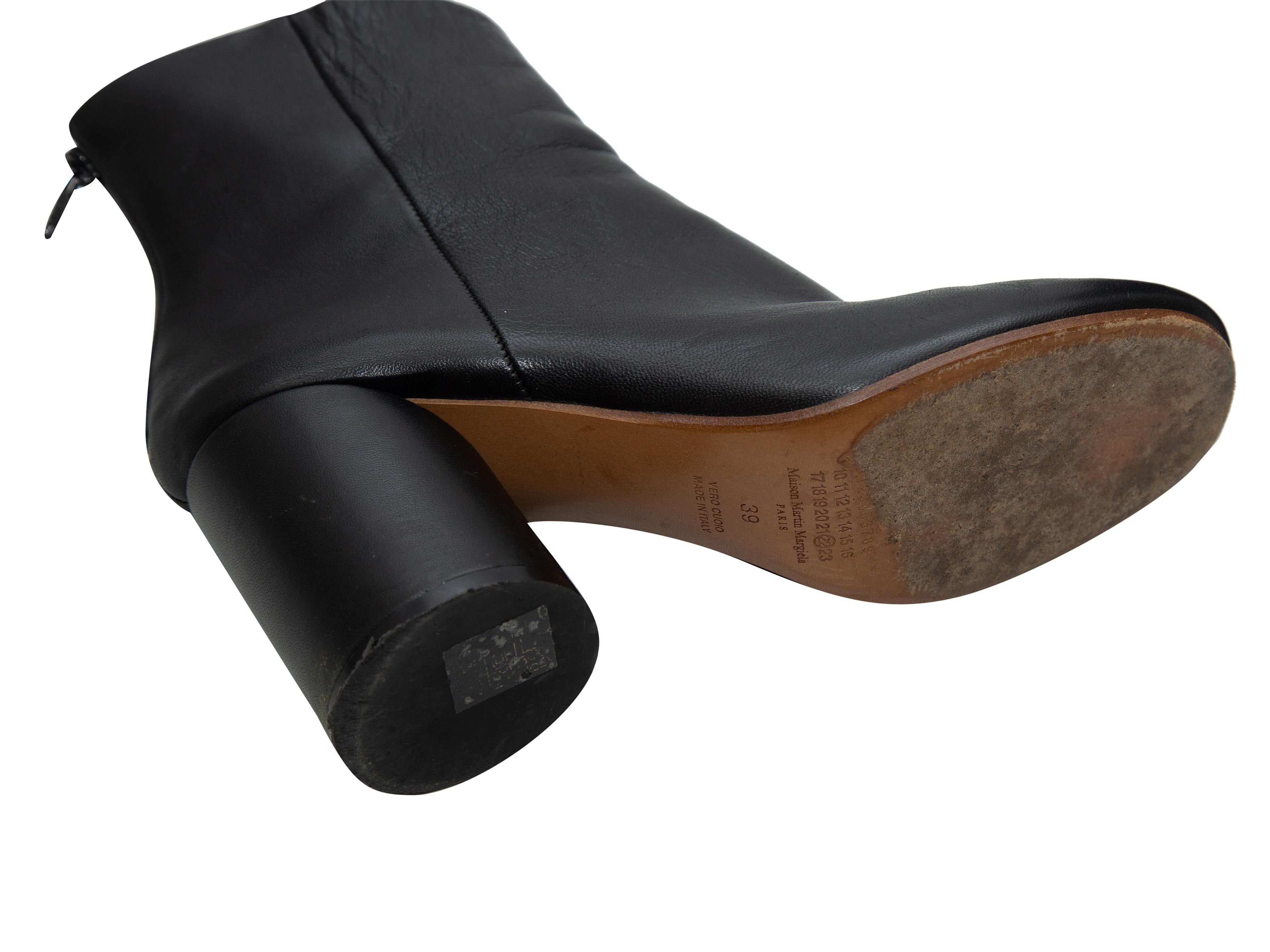 Product details: Black leather round-toe ankle boots by Maison Margiela. Block heels. Zip closures at backs. Designer size 39. 3