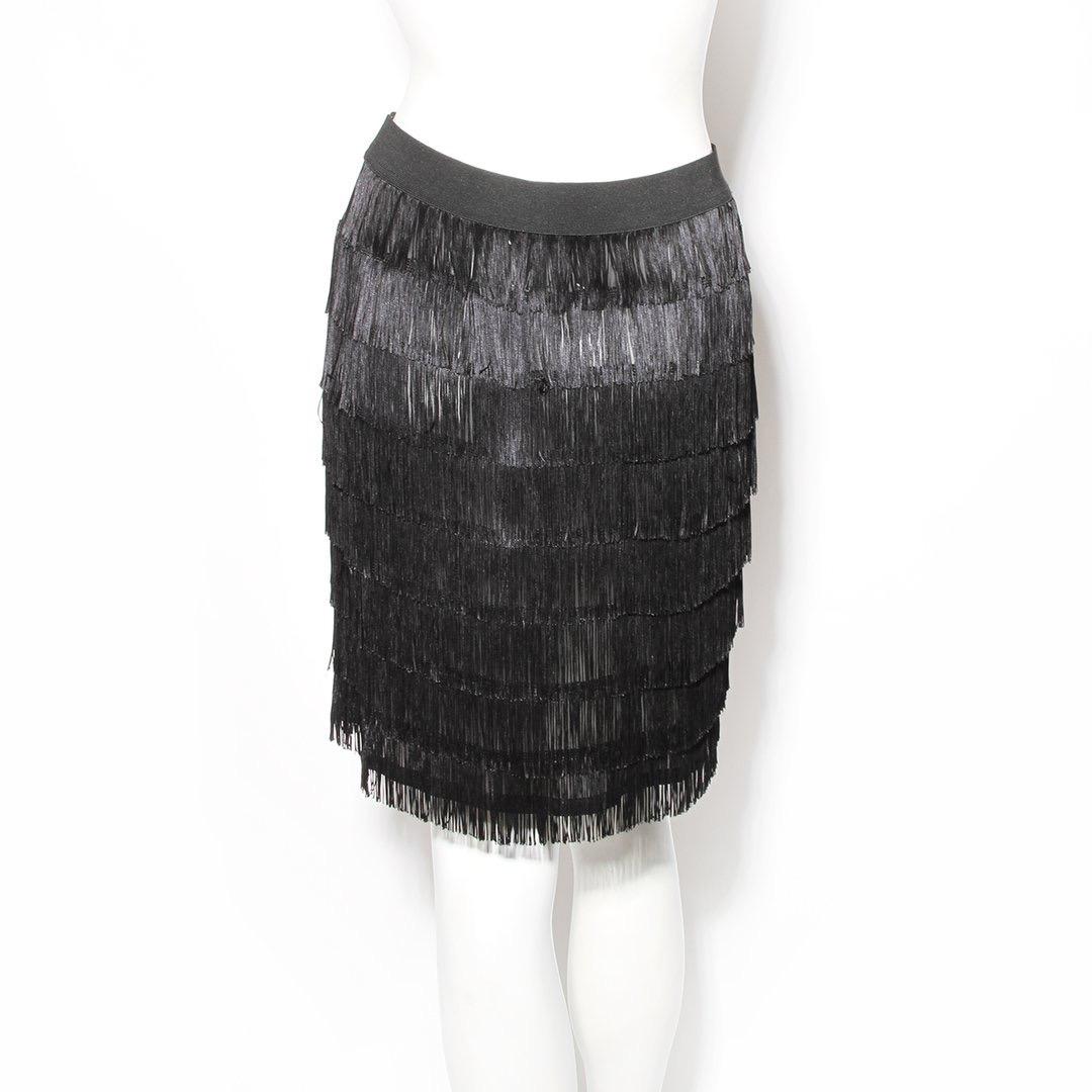 Fringe skirt by Maison Margiela 
Black 
Fringe layers 
Elastic waistband 
Semi-sheer 
High waisted 
100% Rayon
Made in Italy
Condition: Excellent, little to no visible wear. (see photos) 
Size/Measurements: (approximate, taken flat) 
Size 40 IT
27
