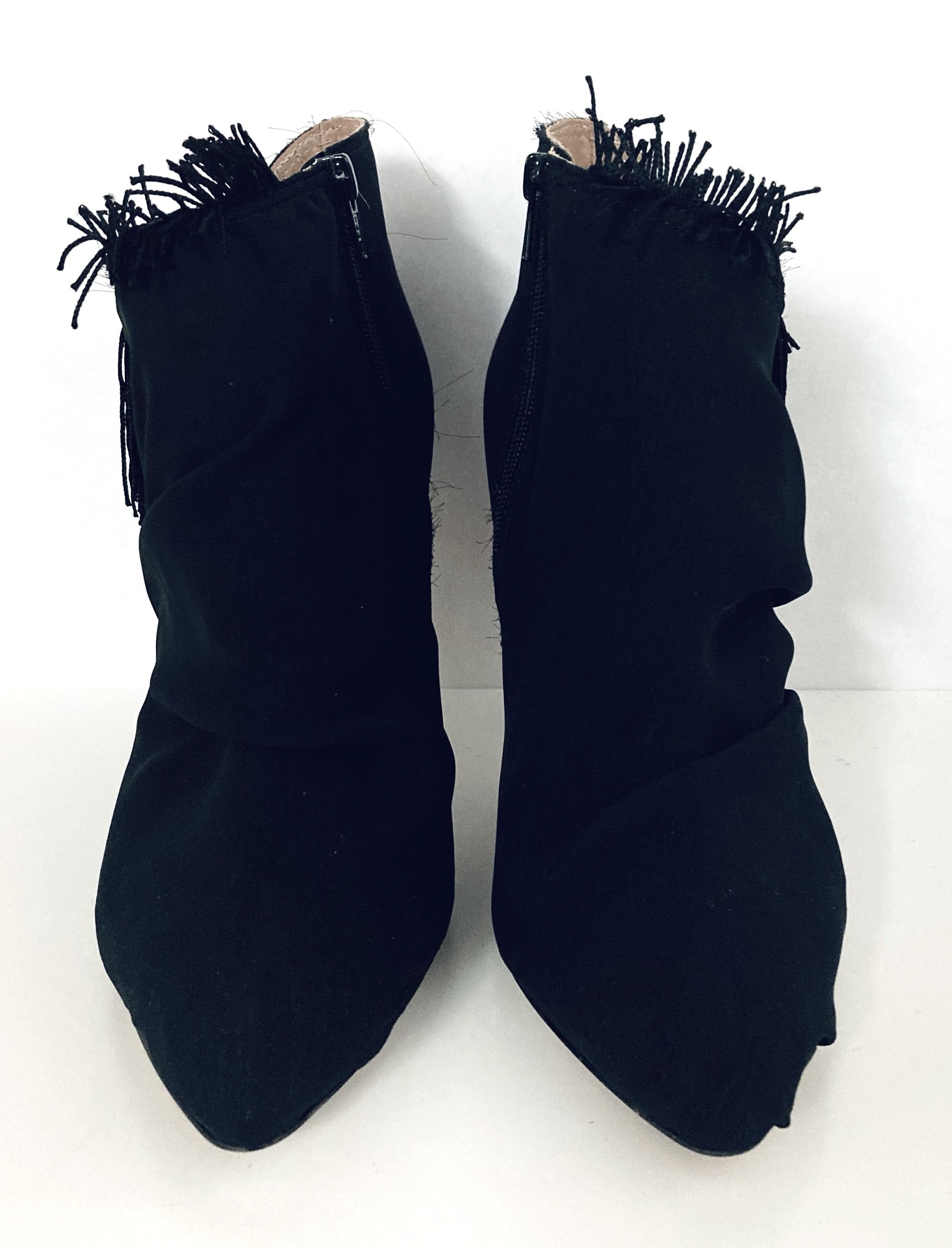 Cool and quirky Maison Margiela ankle boots - bought for £695 and unworn. They have a softly draped, fabric swagged covering with structured inner and irregular fringed trim to top. Have a stiletto heel and zips to fasten. Size 36.5. Measure approx