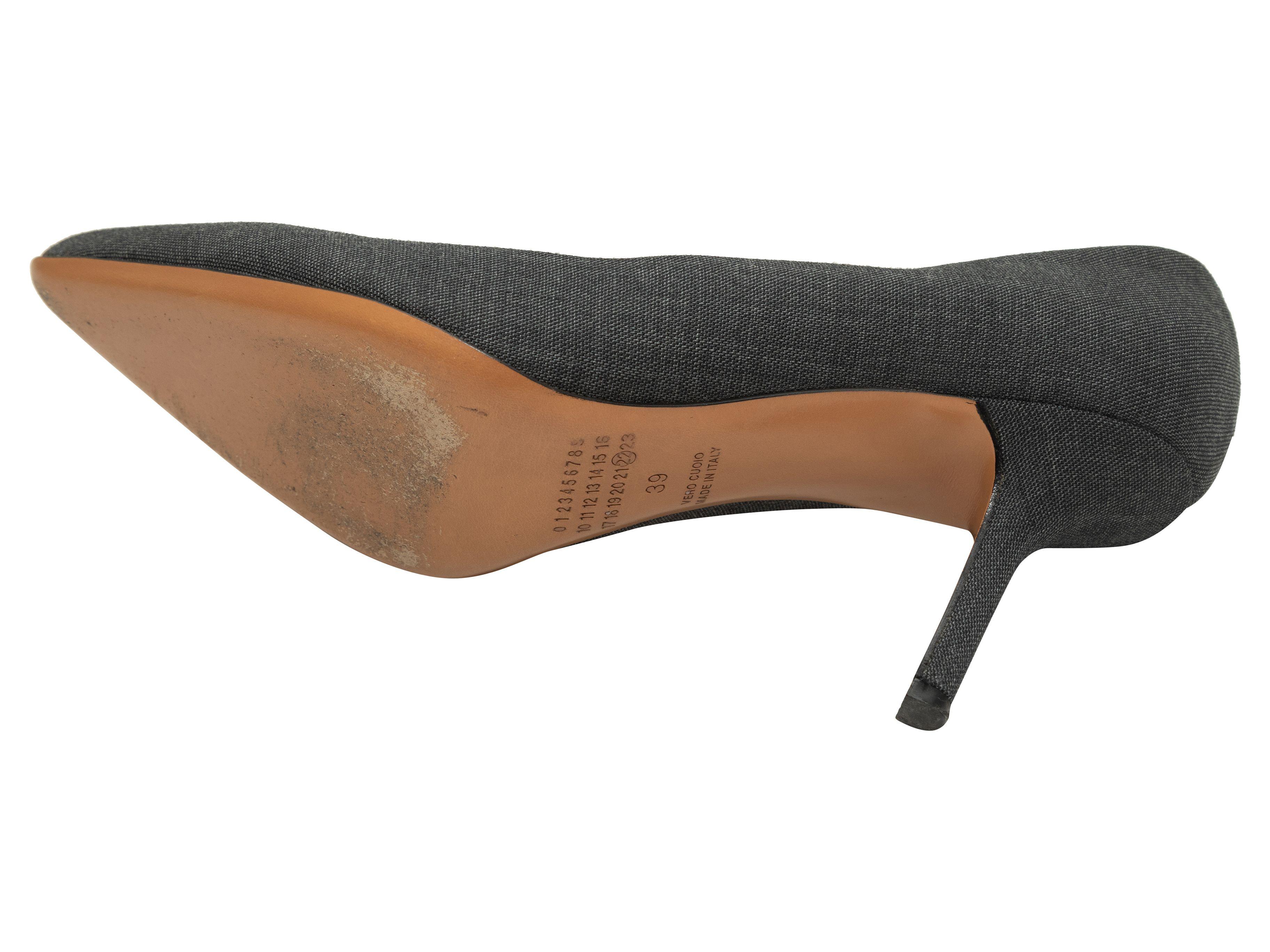 Product Details: Grey wool pointed-toe pumps by Maison Margiela. Covered heels. 3