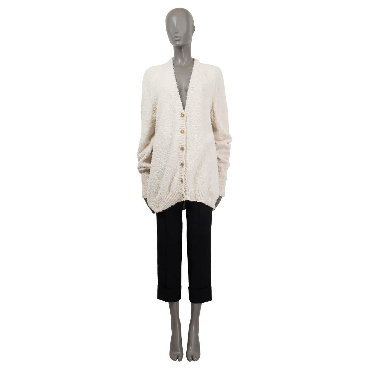 100% authentic Maison Margiela oversized knit cardigan in off-white cotton (86%) and polyamide (14%). Opens with buttons on the front. Unlined. Has been worn and is in excellent condition.

Measurements
Tag Size	XS
Size	XS
Shoulder Width	41cm