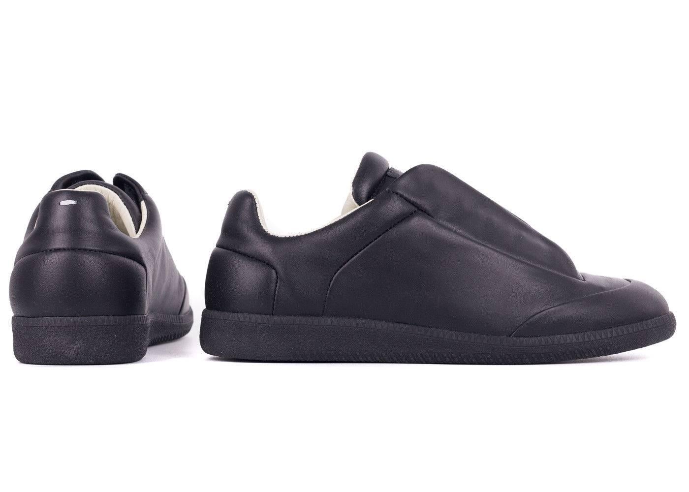 Start your day off in your Future Low Cut Sneakers from Maison Martin Margiela. These genuine leather sneakers feature a hidden lace up closure, matching rubber sole, and ivory leather insole. You can pair these sneakers with blue denim and a rolled