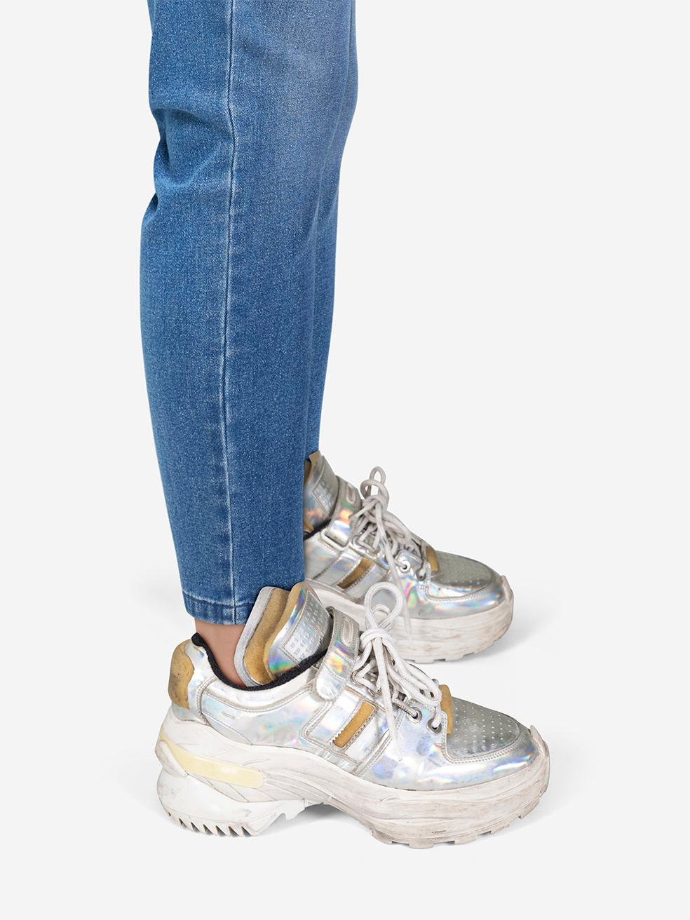 CONDITION is Very good. Minimal wear to the trainers is evident. Scratching to the toe box and both sides of both shoes on this used Maison Margiela designer resale item.
 
 Details
 
 
 Model: Retro Fit Deconstructed Trainers 
 
 Metallic silver
 
