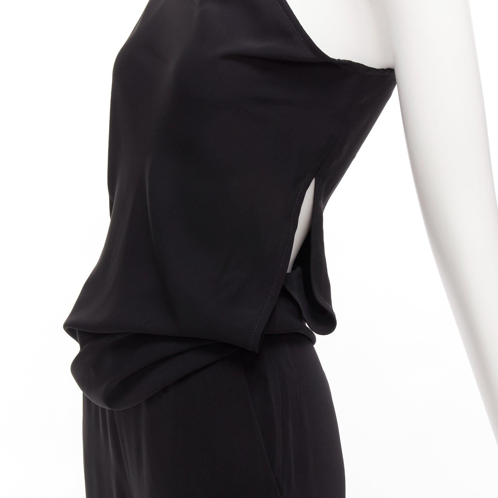 MAISON MARGIELA MM6 black one shoulder drape cut cropped jumpsuit FR36 S
Reference: AAWC/A01164
Brand: Maison Margiela
Collection: MM6
Material: Polyester
Color: Black
Pattern: Solid
Closure: Zip
Lining: Black Viscose
Extra Details: Side cut out at