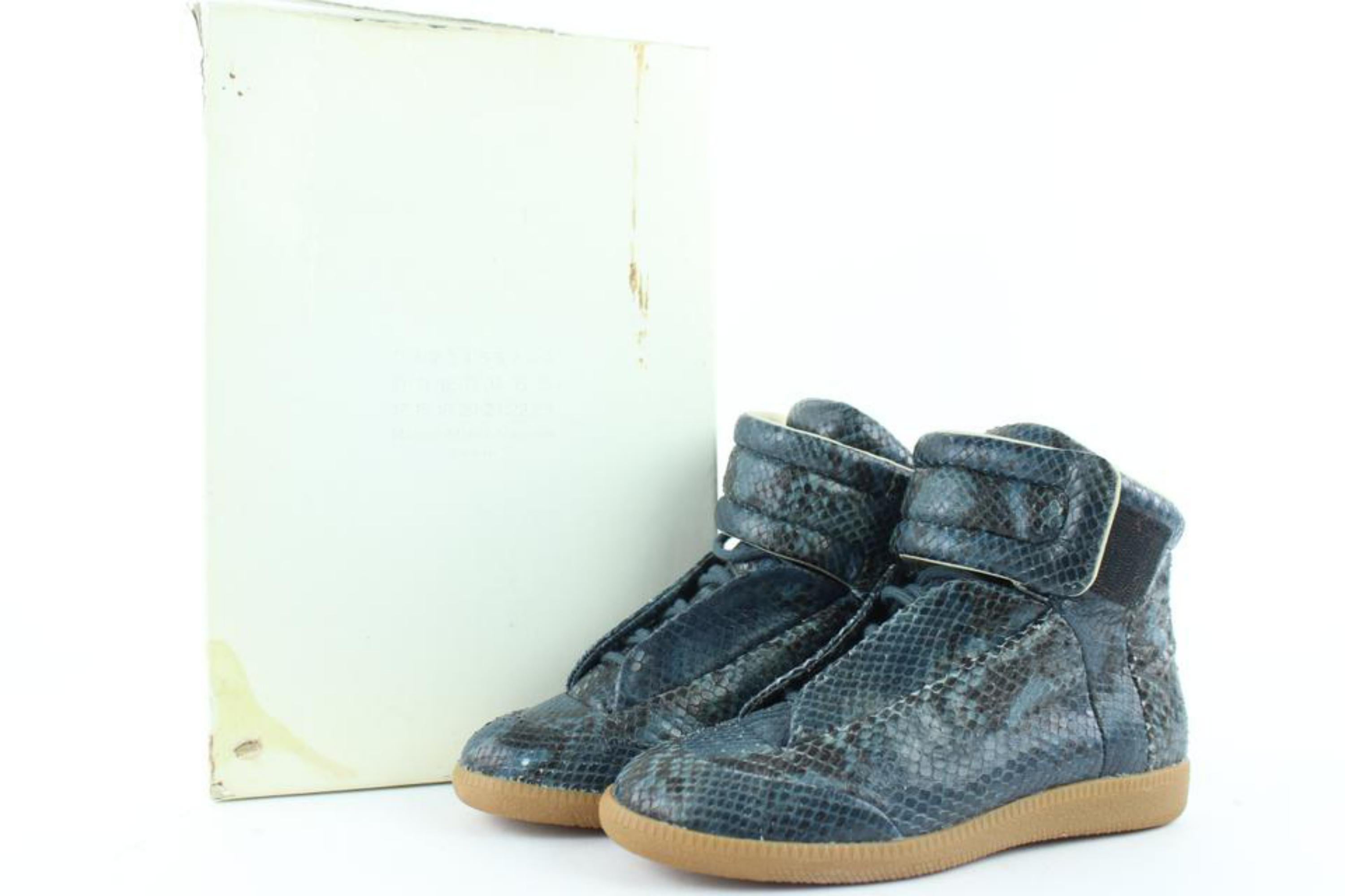 Made In: Italy
Size: 6.5
OVERALL EXCELLENT+ CONDITION
( 9.5/10 or A+ )
Includes Box
Retail $995
Signs of Wear:
Exterior: light scuffs on the piece of a pattern from python leather 
Interior: wiped off 
Sole: light scuffs 
Heel taps: light scuffs,