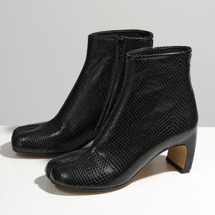 Ankle-high python-embossed leather boots in black. Square cleft toe. Signature stitch in white at heel collar. Zip closure at inner side. Buffed leather lining in tan. Covered block heel. Leather sole in tan. Tonal hardware.

COLOR: Black
MATERIAL: