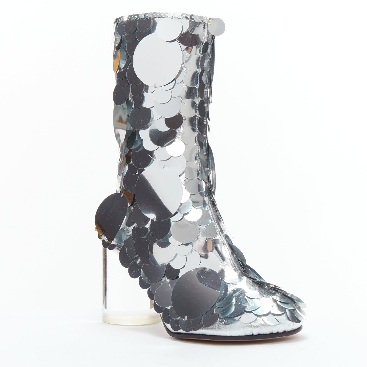 MAISON MARGIELA silver pailette clear lucite heels ankle boots EU39
Reference: BSHW/A00151
Brand: Maison Margiela
Collection: 2018
Material: Plastic, Leather, Acetate
Color: Silver, Clear
Pattern: Sequins
Closure: Zip
Lining: Black Leather
Extra