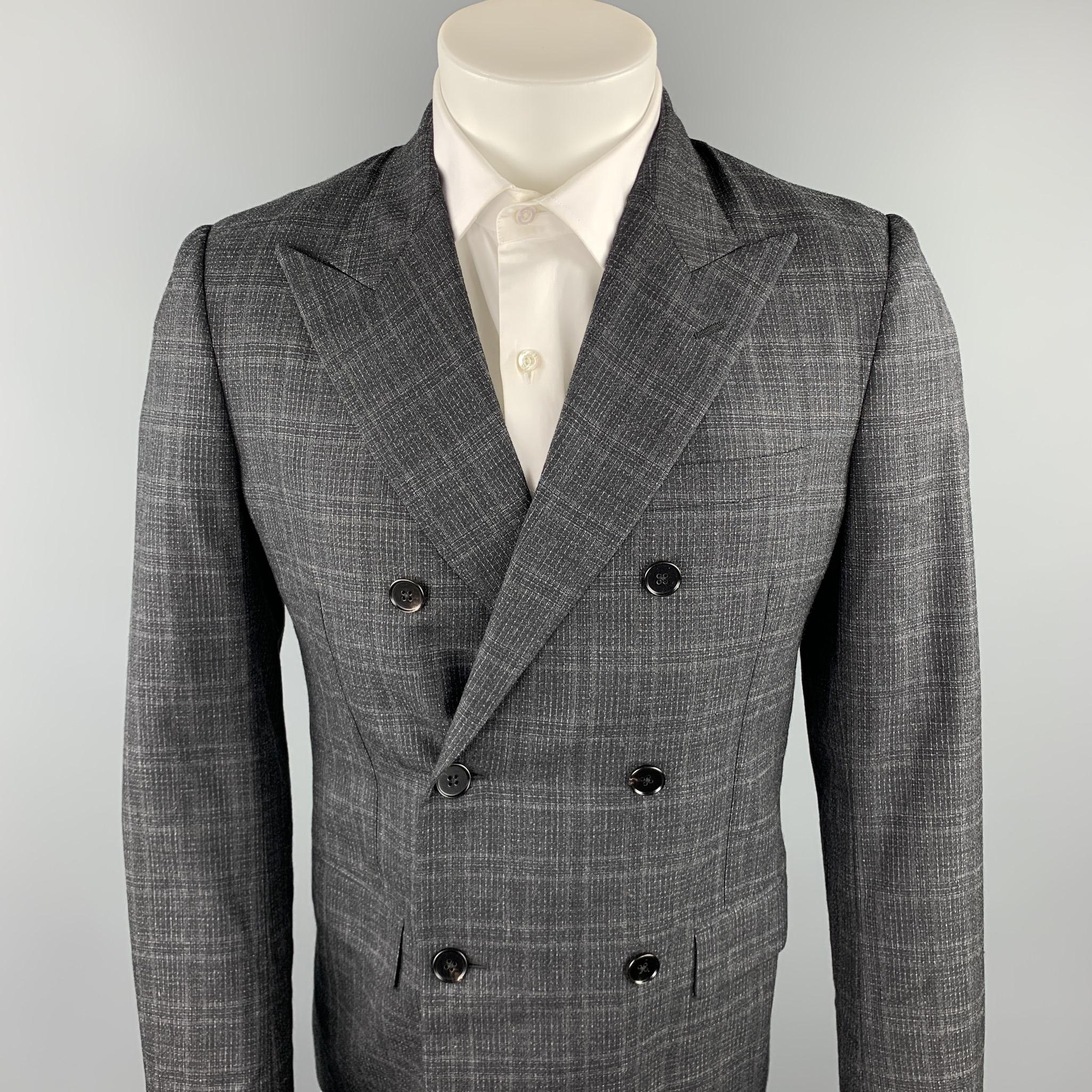 MAISON MARGIELA sport coat comes in a charcoal plaid wool / silk with a full black liner featuring a peak lapel, flap pockets, and a double breasted closure. Made in Italy.

Excellent Pre-Owned Condition.
Marked: IT 48

Measurements:

Shoulder: 16.5