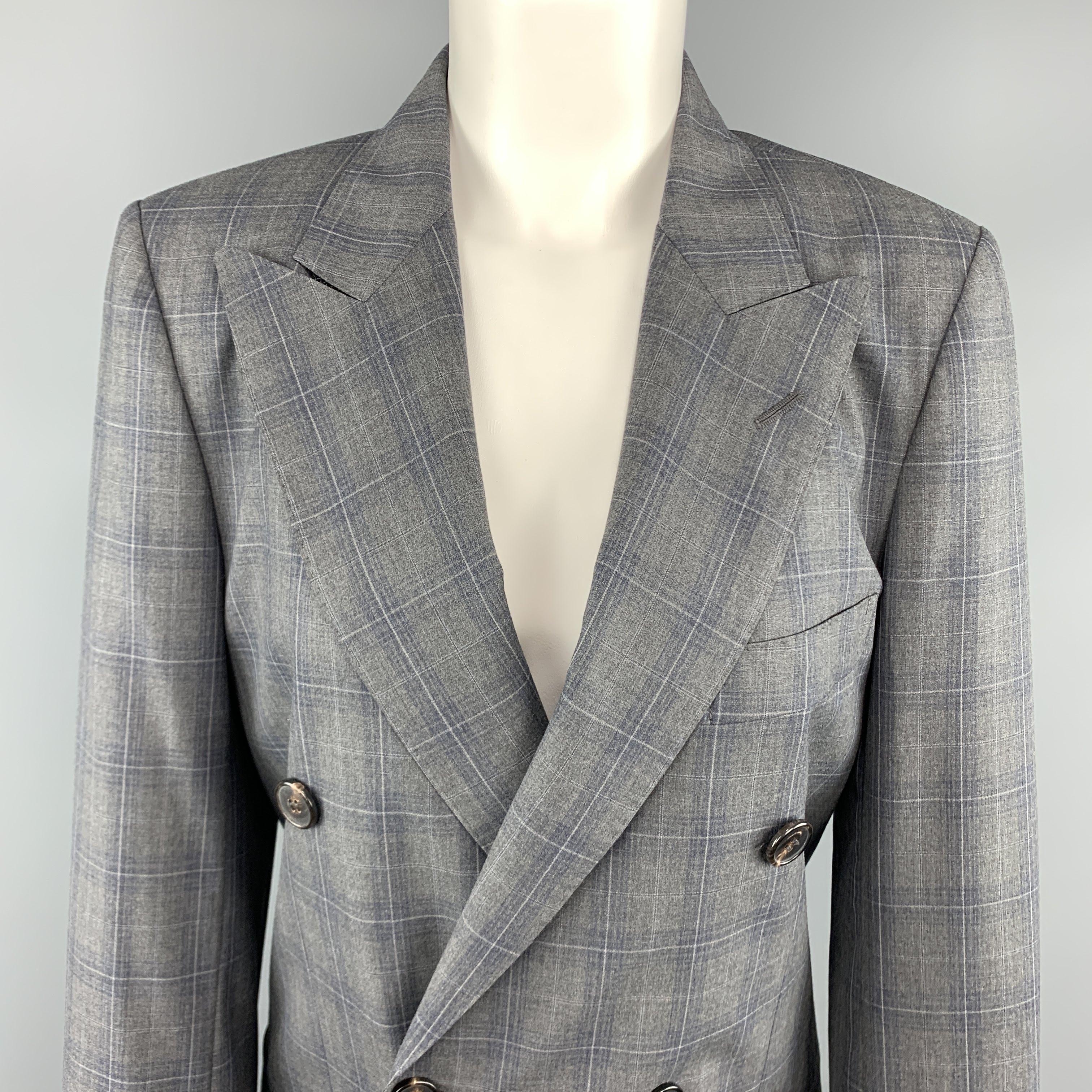 MAISON MARGIELA blazer jacket comes in cool gray light weight wool with blue plaid pattern and features a peak lapel, double breasted front, and signature white stitch detailed back. Made in Italy.
 
New with Tags.
Marked: IT 40
 
Measurements:

