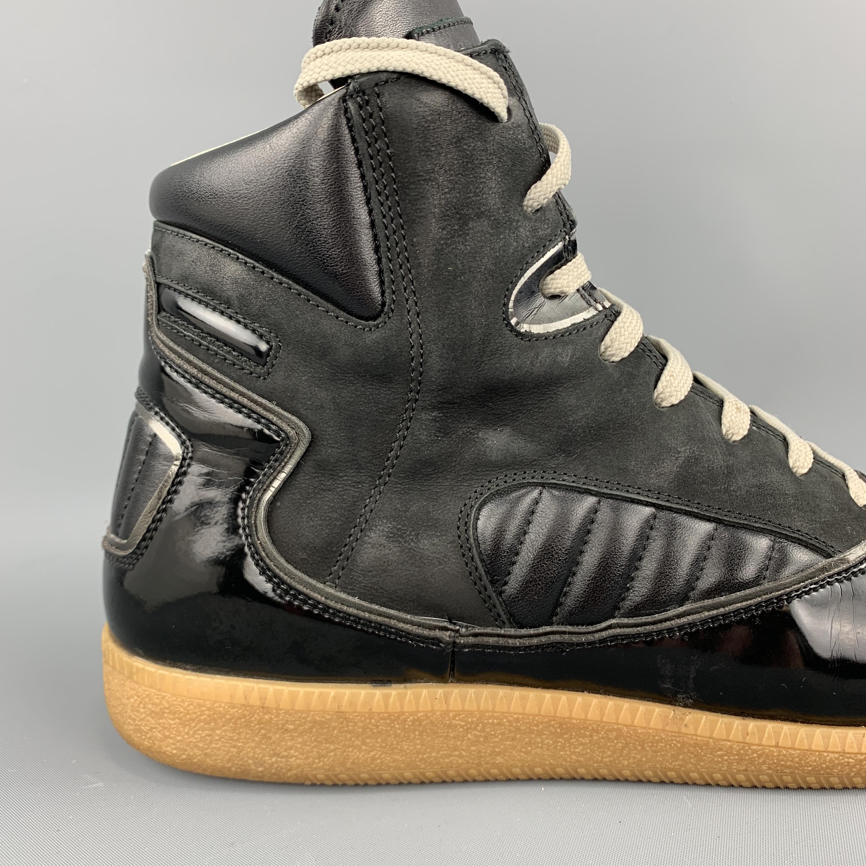 MAISON MARTIN MARGIELA replica high top sneakers come in black patent leather with smooth quilted leather details, metallic leather piping, and tan gum sole. With box. Made in Italy.

Very Good Pre-Owned Condition.
Marked: IT 42

Outsole:  11.5 x 4