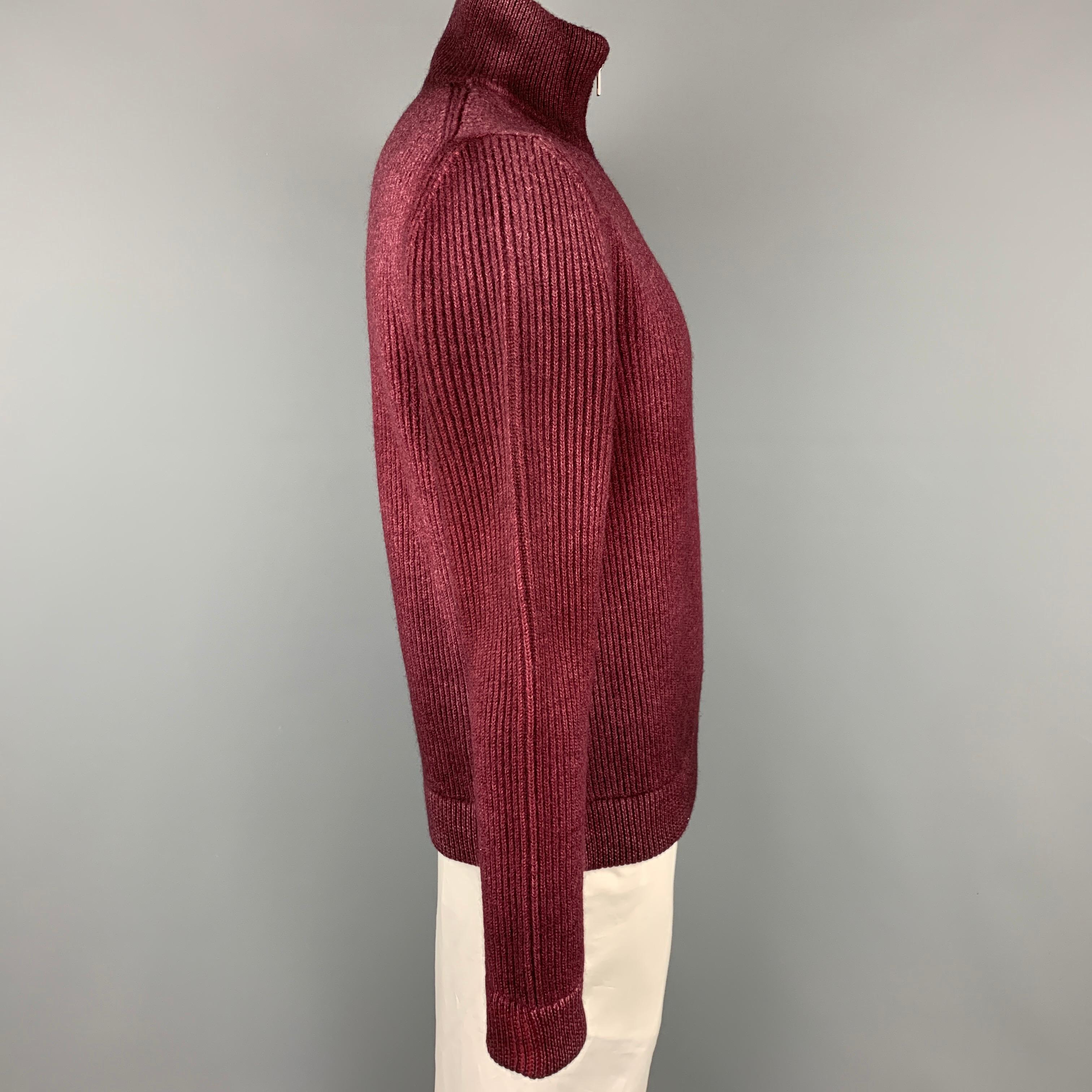 MAISON MARGIELA cardigan sweater jacket comes in a burgundy knitted wool featuring a high collar and a full zip closure. Made in Italy. 

Excellent Pre-Owned Condition.
Marked: L

Measurements:

Shoulder: 17 in.
Chest: 42 in.
Sleeve: 28.5