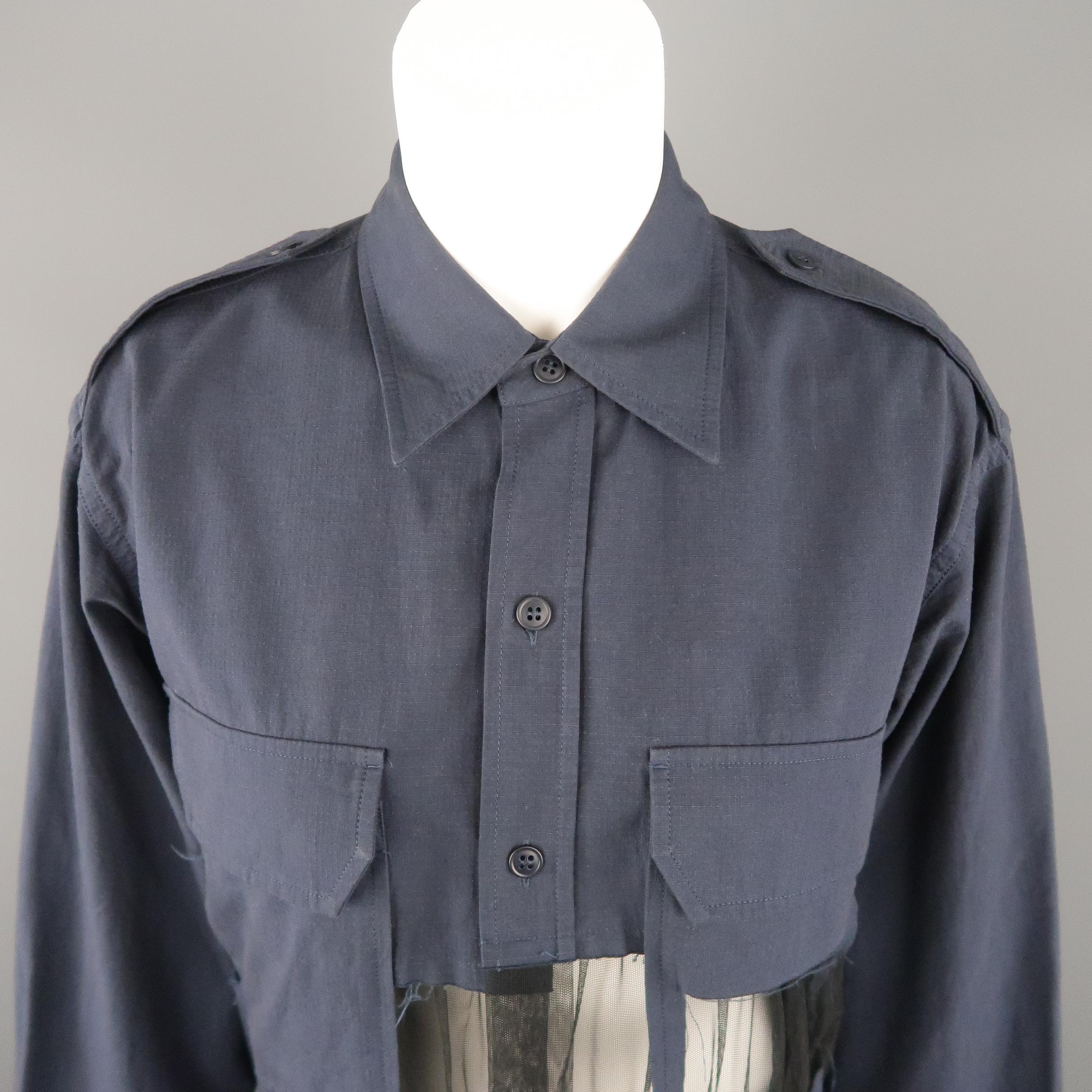 MAISON MARGIELA oversized military style shirt comes in muted navy blue textured canvas with a pointed collar, epaulets, patch flap breast pockets, and gathered black tulle deconstructed insert panels. Made in Italy.
 
Excellent Pre-Owned