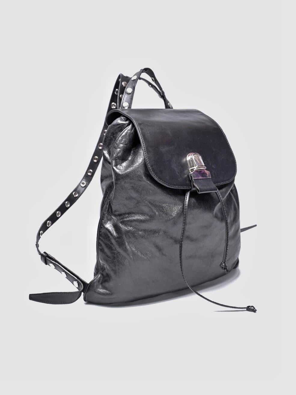 Maison Margiela Stud-Embellished Black Leather Backpack

Discover Timeless Elegance with Maison Margiela's Stud-Embellished Black Leather Backpack. This Cracked Leather Marvel Features Tonal Trim, Signature Stitched Detailing, and Adjustable Straps