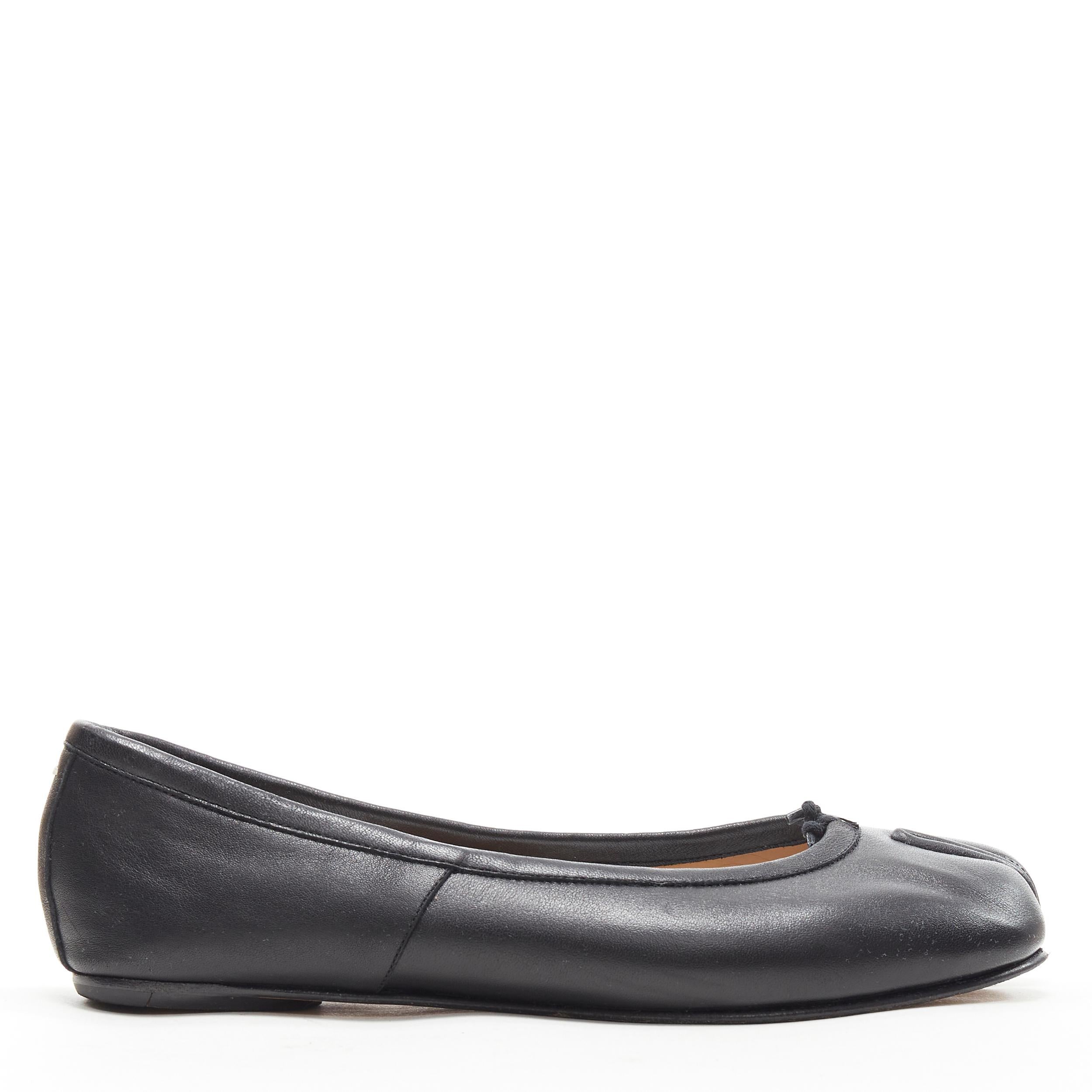 MAISON MARGIELA Tabi black leather split toe ballerina flats EU37 
Reference: LNKO/A01779 
Brand: Maison Margiela 
Model: Tabi flats 
Material: Leather 
Color: Black 
Pattern: Solid 
Made in: Italy 

CONDITION: 
Condition: Excellent, this item was