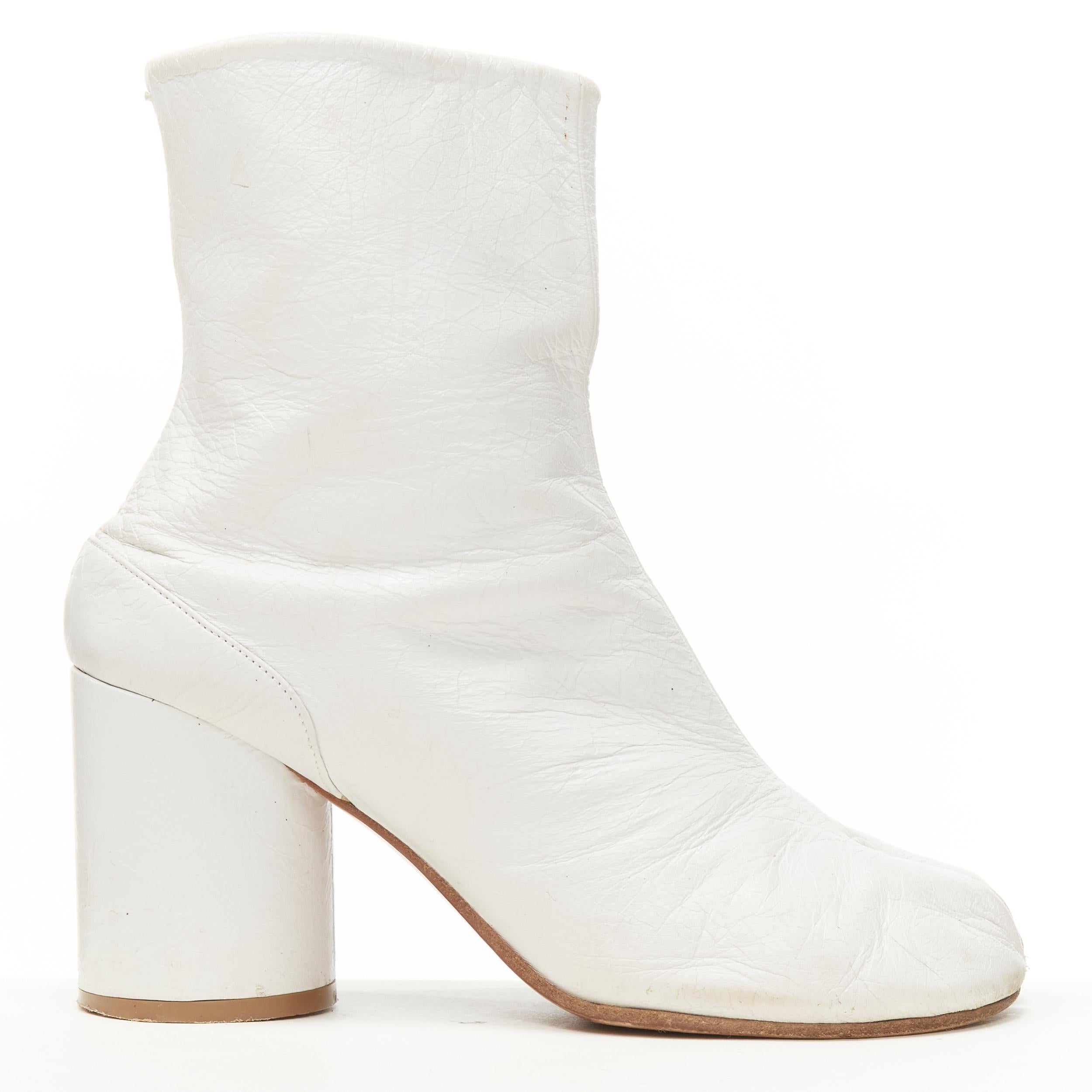 MAISON MARGIELA TAbi white crinkled leather cone heel ankle boot EU36 

Reference: JACG/A00067 
Brand: Maison Margiela 
Material: Leather 
Color: White 
Pattern: Solid 
Closure: Hook Bar 
Extra Detail: Signature split toe. Cone heel. Crinkled soft