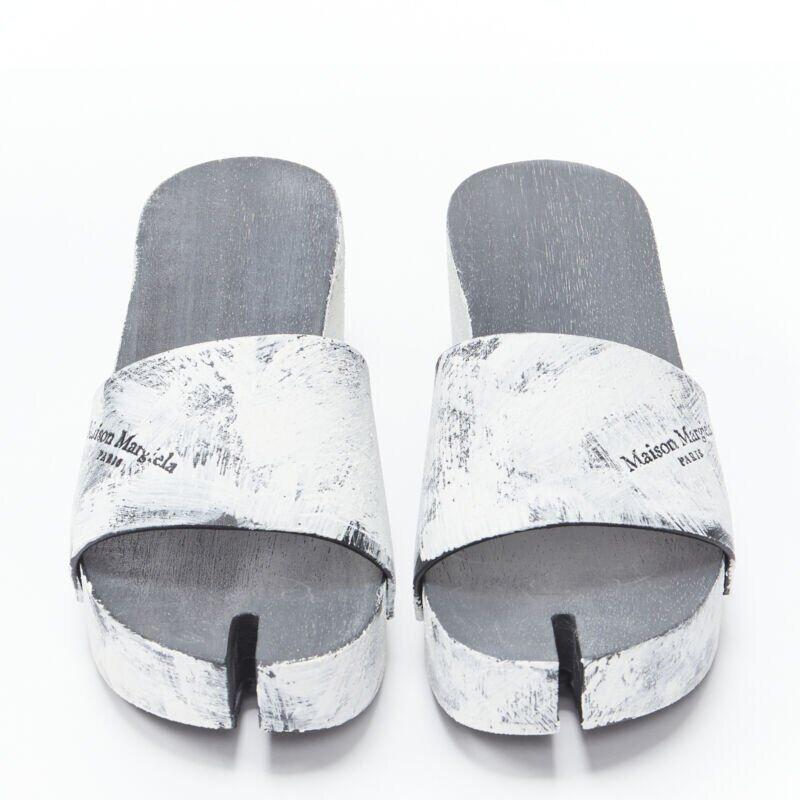 MAISON MARGIELA Tabi white painted cone heel wooden clog sandals EU35
Reference: TGAS/B01330
Brand: Maison Margiela
Designer: John Galliano
Model: Tabi wooden clog
Material: Wood
Color: White
Pattern: Solid
Extra Details: Tabi split toe. Wooden