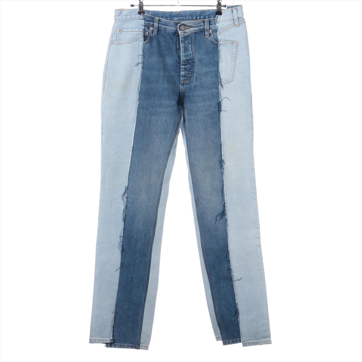 The Maison Margiela Two-Toned Cotton Denim Pants are a bold and contemporary take on classic denim. Crafted from premium cotton, the pants feature a striking two-toned design that seamlessly combines contrasting denim shades for a unique, modern