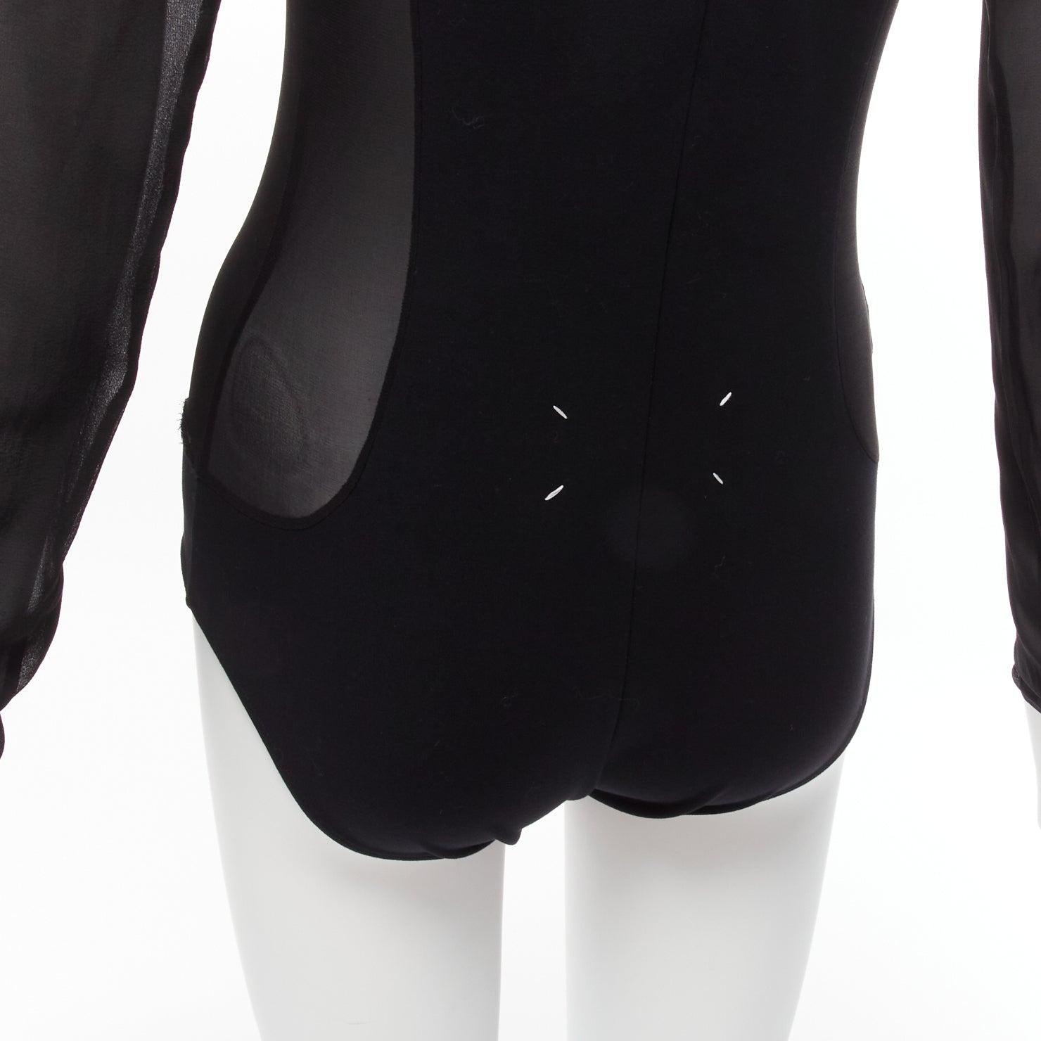 MAISON MARGIELA Vintage black silk blend sheer turtleneck bodysuit FR40 L
Reference: CAWG/A00274
Brand: Maison Margiela
Designer: Martin Margiela
Material: Silk, Blend
Color: Black
Pattern: Solid
Closure: Zip
Extra Details: Back zip closure.