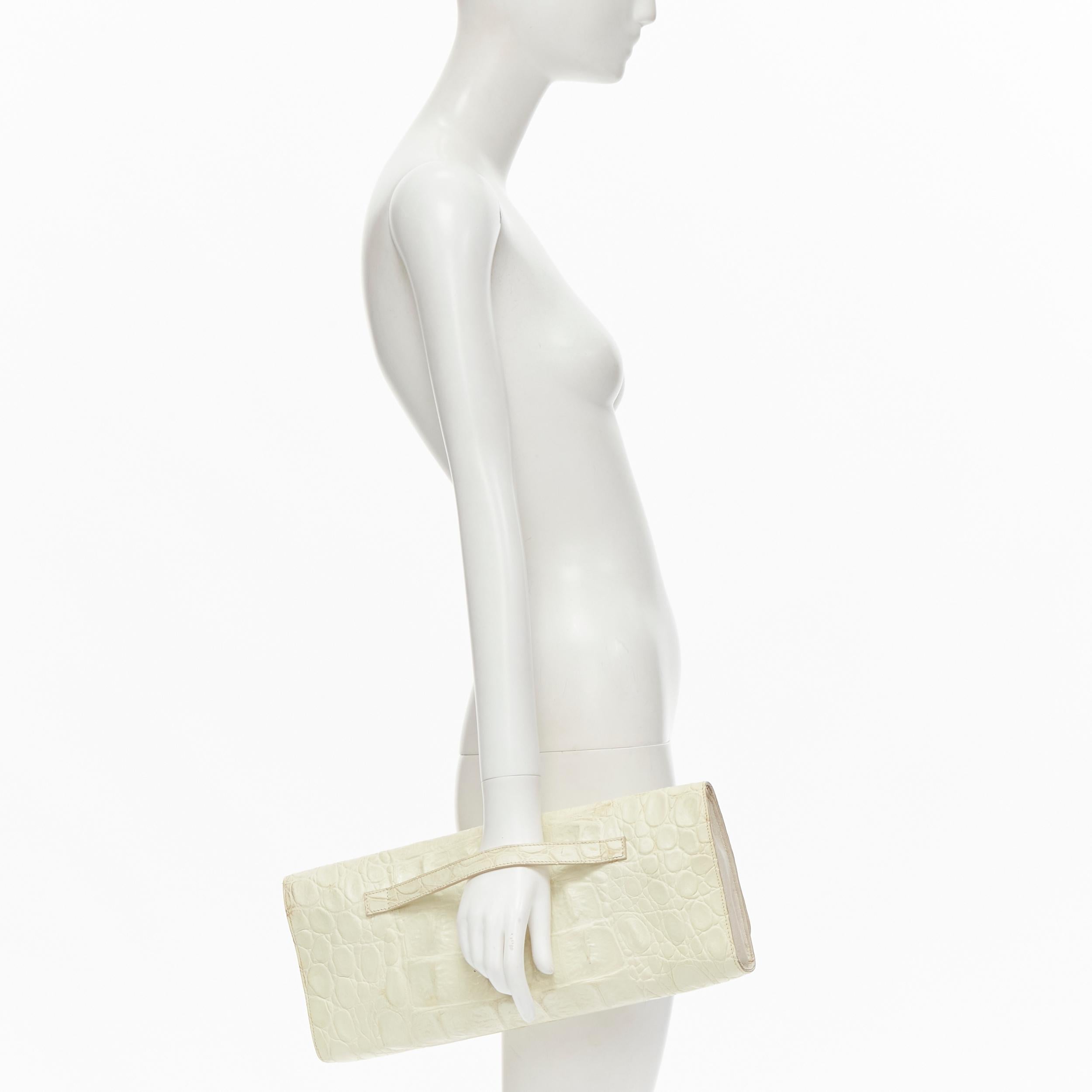 MAISON MARGIELA VIntage off white mock croc leather oversized flap clutch bag 
Reference: TGAS/C01093 
Brand: Maison Margiela 
Material: Leather 
Color: Off white 
Pattern: Solid 
Closure: Magnet 
Extra Detail: Oversized textured mock croc leather