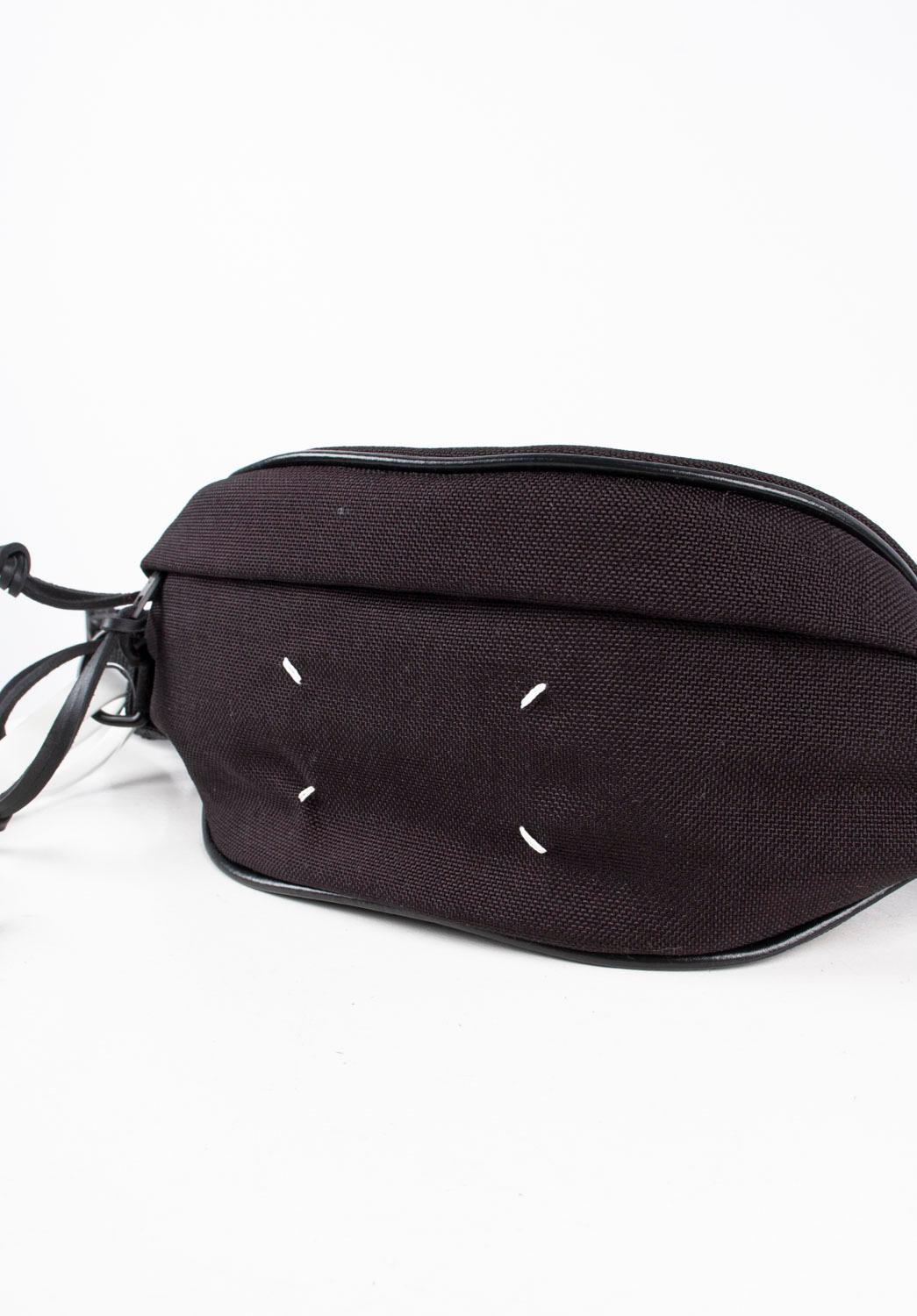 Check my other listings. Have many more designer clothes for sale. Open to any offers.
Item for sale is 100% genuine Maison Margiela waist bag with dust bag
Color: black
Material: 100% nylon
Tag size: one size
This jumper is great quality item. Rate