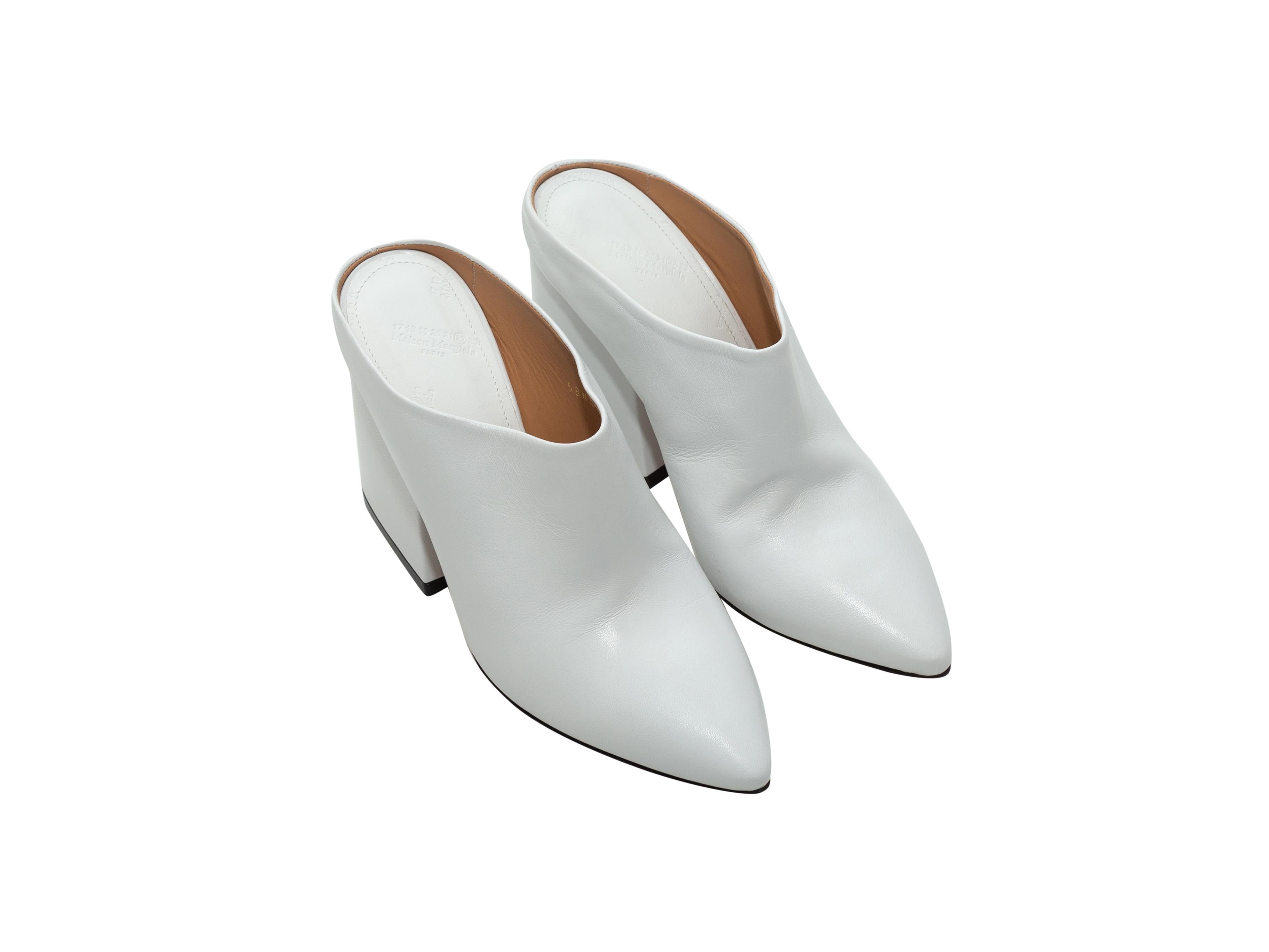 Product details: White pointed-toe leather mules by Maison Margiela. Block heels. Designer size 37. 3.5