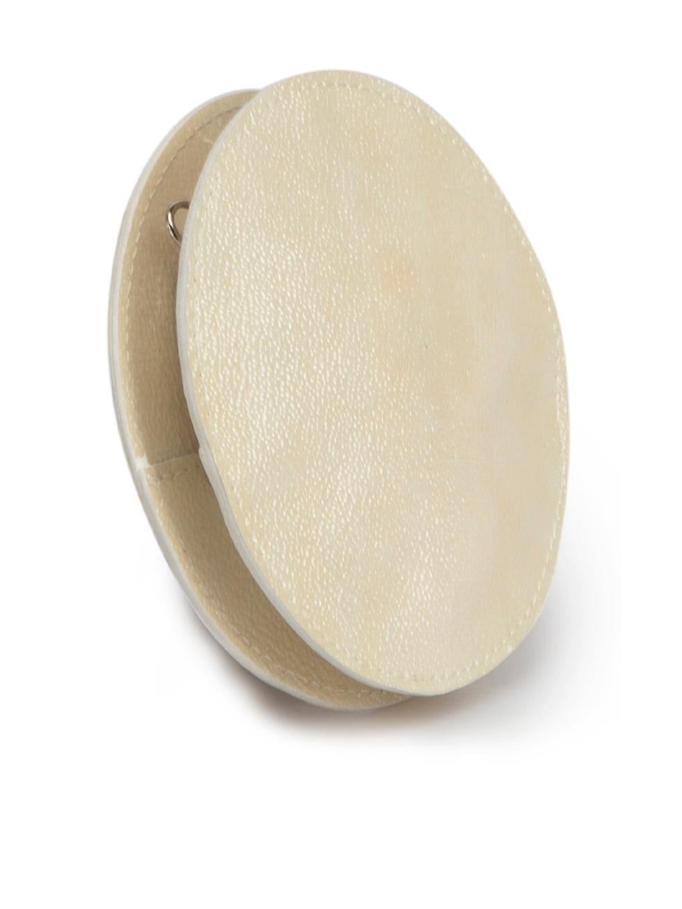 CONDITION is Never worn, with tags. Visible wear to purse is evident with discolouration to the stitching due to poor storage on this new Maison Martin Margiela designer resale item.



Details


Cream

Patent leather

Mini round coin pouch

Metal