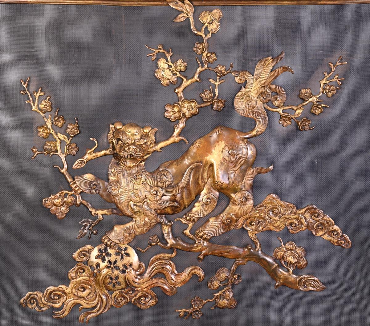 This firescreen is attributed to the Maison Marnyhac because of the the quality of the bronze and its beautiful perforated decoration, as well as the style of it, and was realized circa 1880.

Maison Marnyhac is the commercial name of a society of