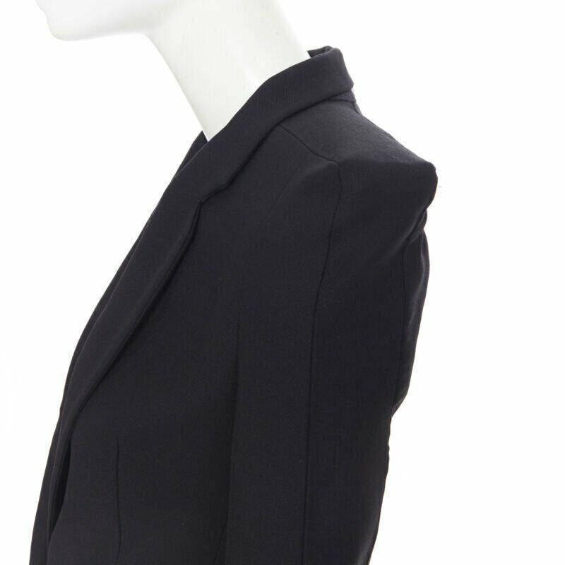 MAISON MARTIN MARGIELA 2007 square cut padded shoulder blazer jacket IT36 XS
Reference: TGAS/A05510
Brand: Maison Margiela
Designer: Martin Margiela
Collection: Fall Winter 2007
Material: Wool
Color: Black
Pattern: Solid
Closure: Button
Extra